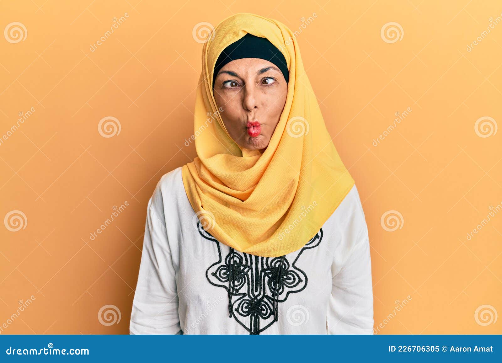 Middle Age Hispanic Woman Wearing Traditional Islamic Hijab Scarf