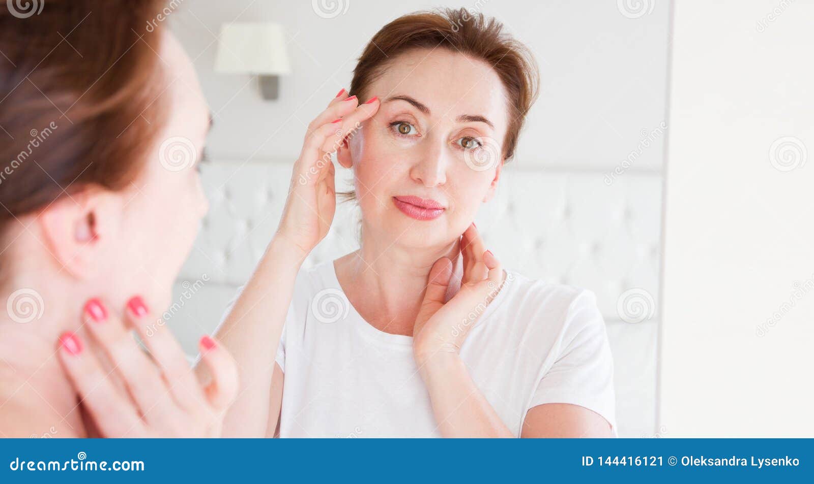 Middle Age Woman Looking in Mirror on Wrinkle Face on Forehead ...