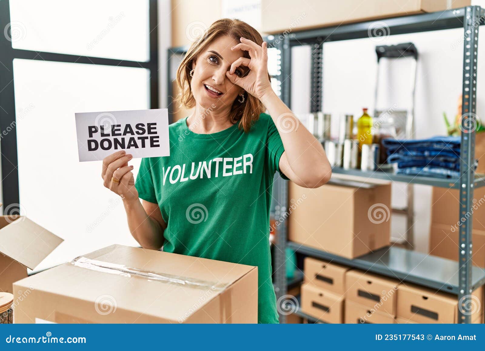 Hand Holding Please Donate Sign Stock Photo 191669165