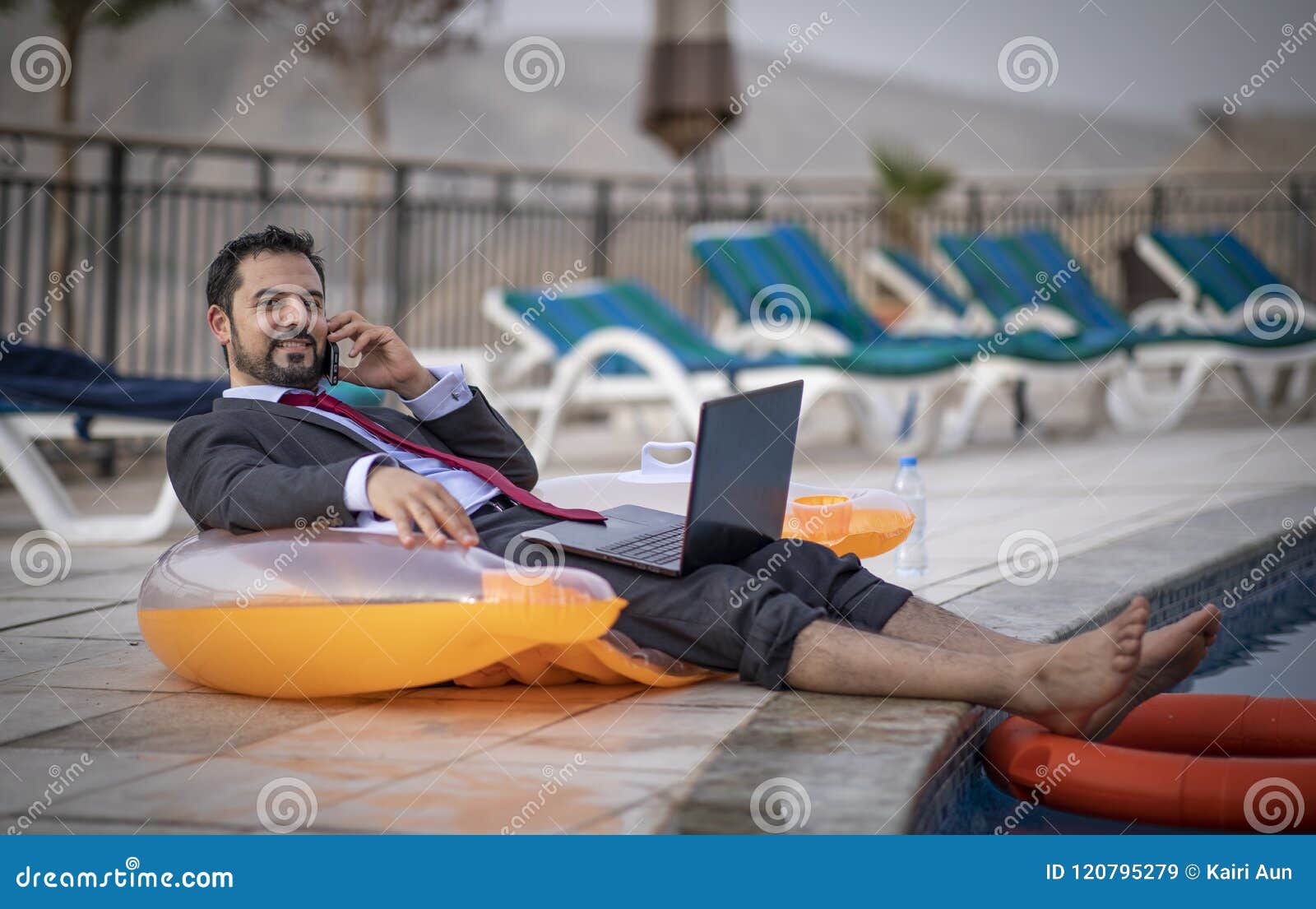 Middle Aged Arab Man by a Pool in His Business Suit Stock Image - Image ...