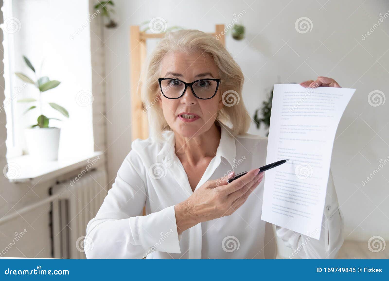 aged businesswoman giving online presentation discuss contract details distantly