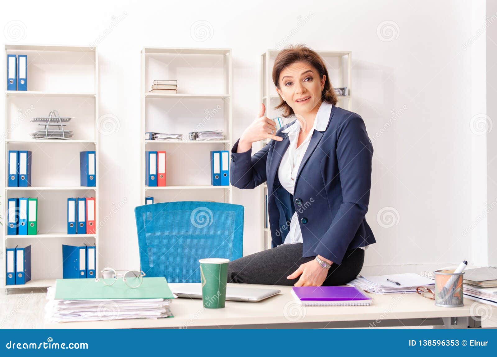 The Middle Aged Female Employee Sitting At The Office Stock Image Image Of Laptop Leadership