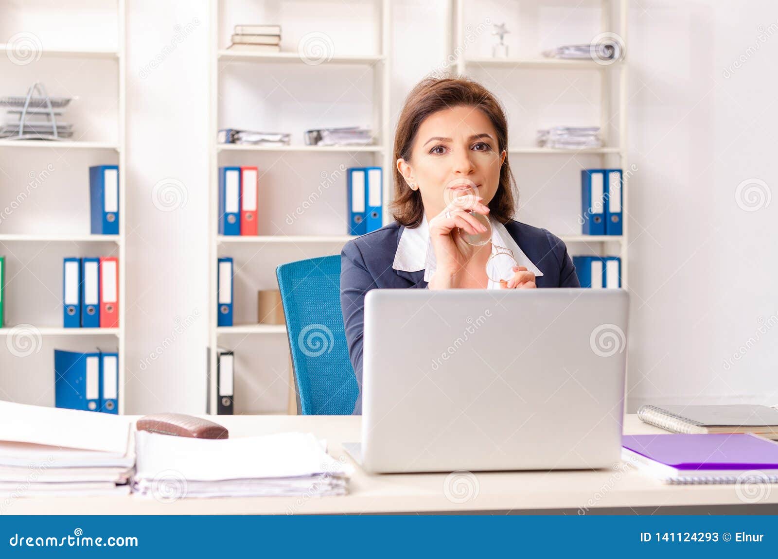 The Middle Aged Female Employee Sitting At The Office Stock Image Image Of Office Company