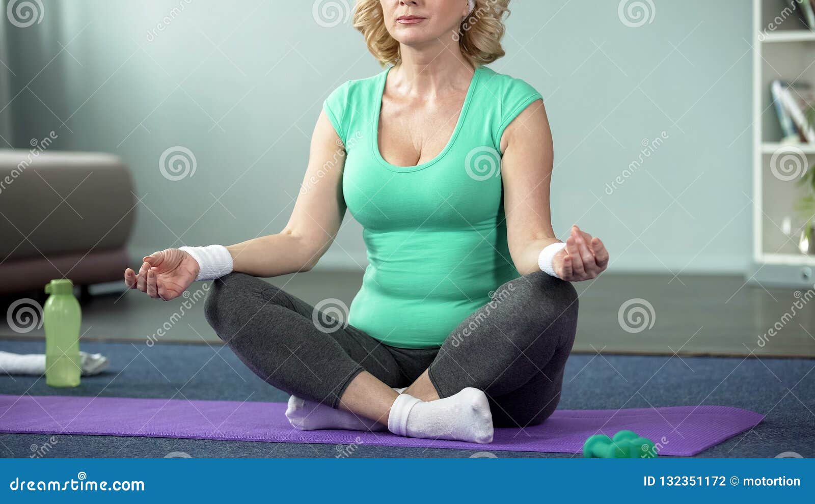 housewife with yoga instructor