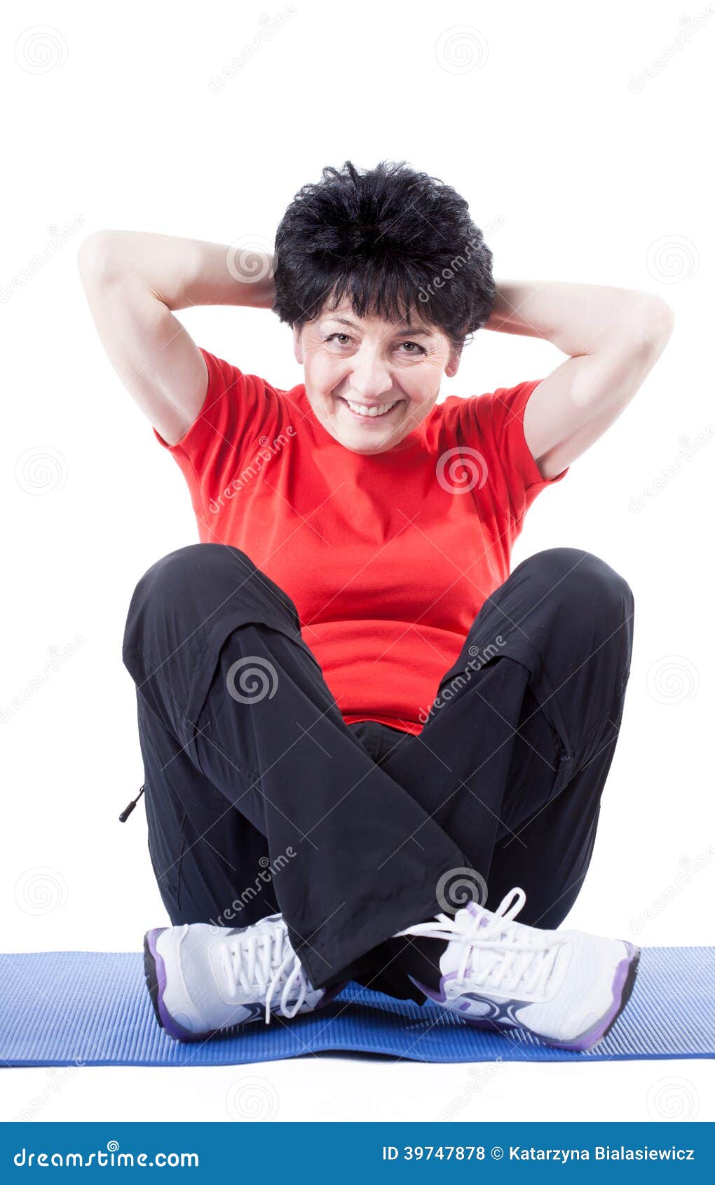 middle-aged woman doing sit-ups
