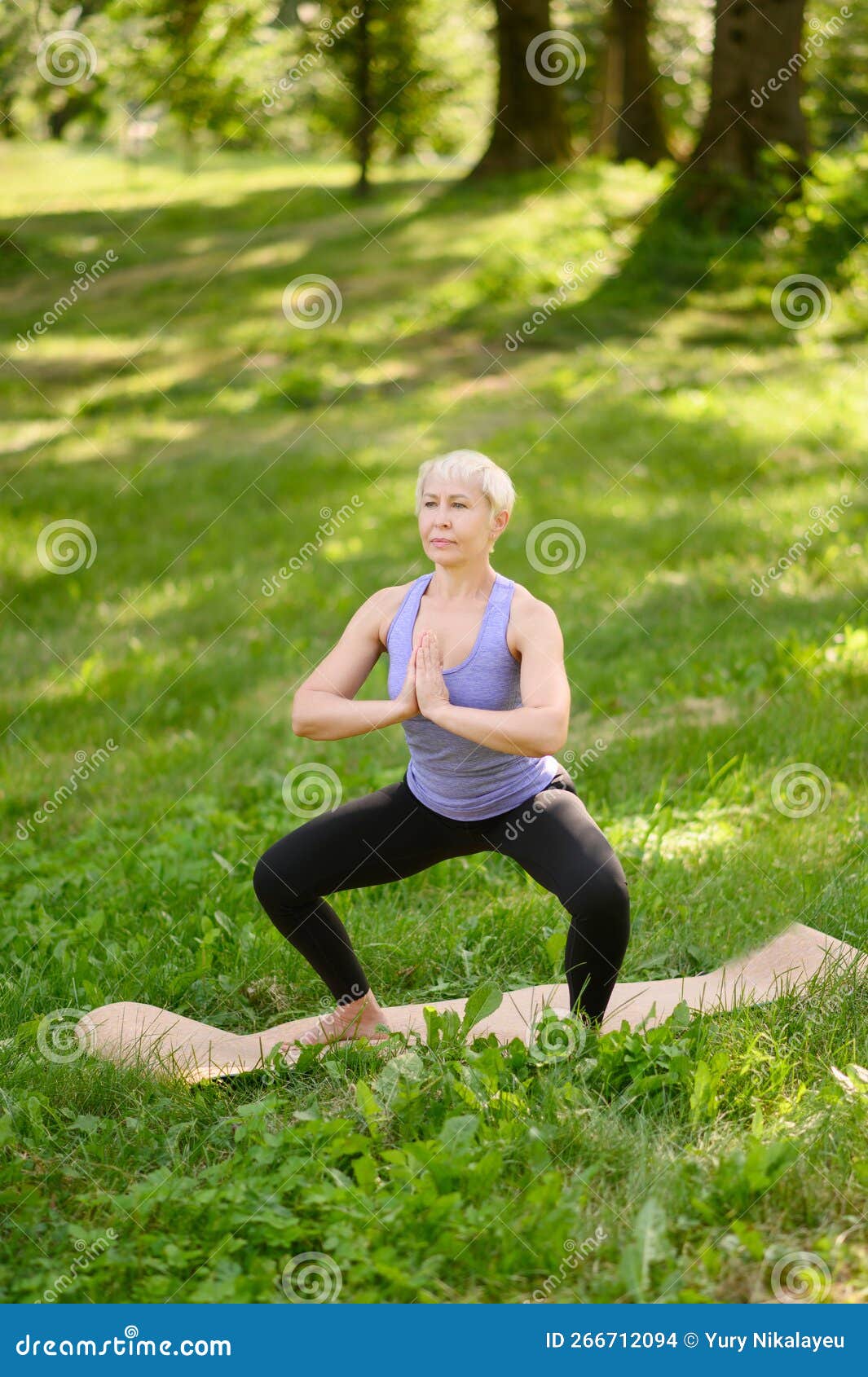Middle-aged Woman Doing Yoga in the Park in the Namaskarasana Pose -  Sitting Prayer Pose Stock Photo - Image of namaste, female: 266712094