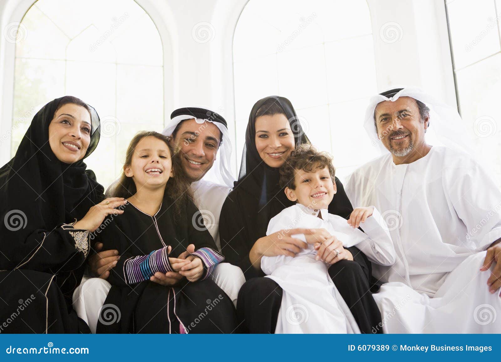 A Middle Eastern Family Sitting In A Park Royalty-Free Stock