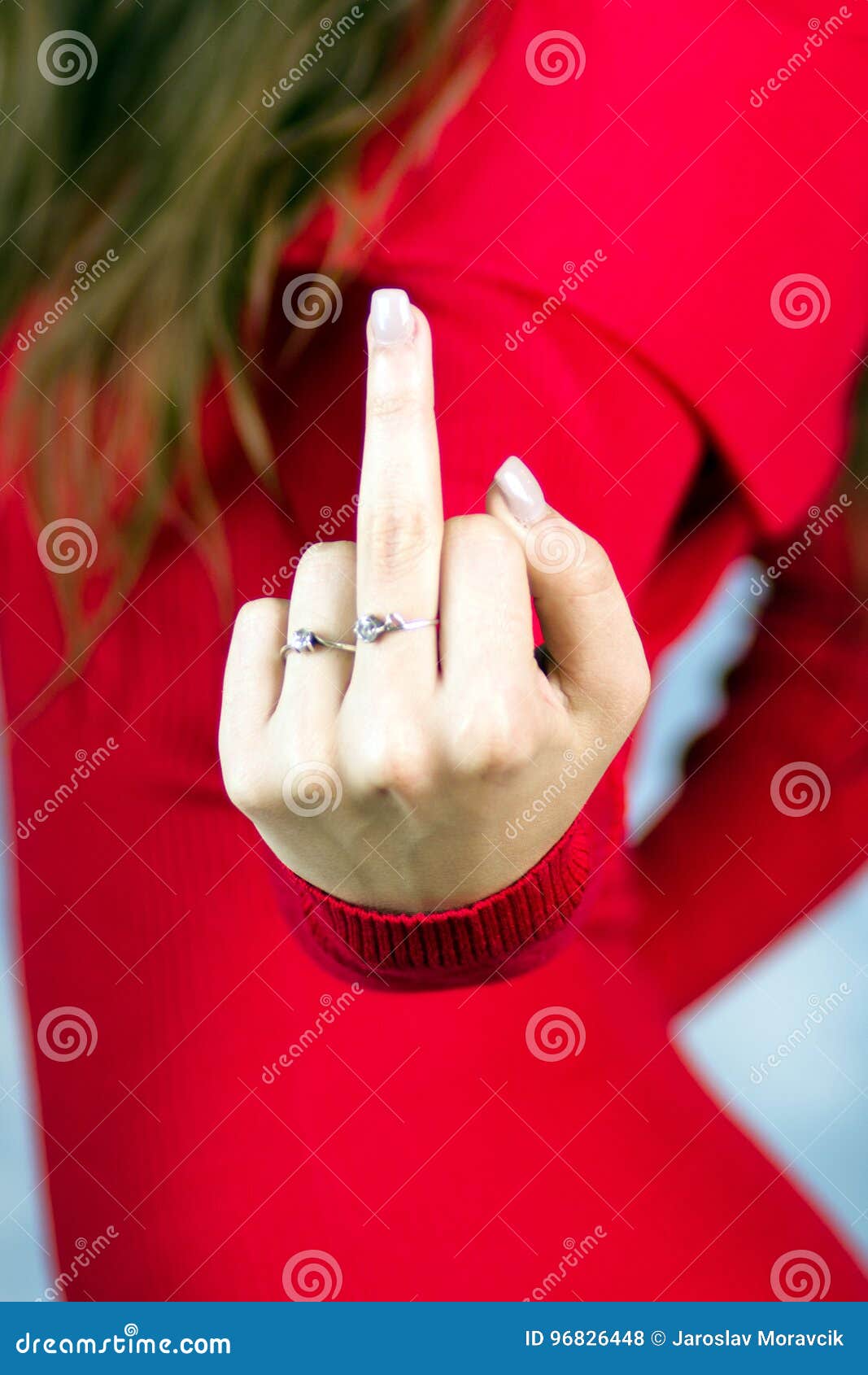 girl showing middle finger Stock Photo | Adobe Stock