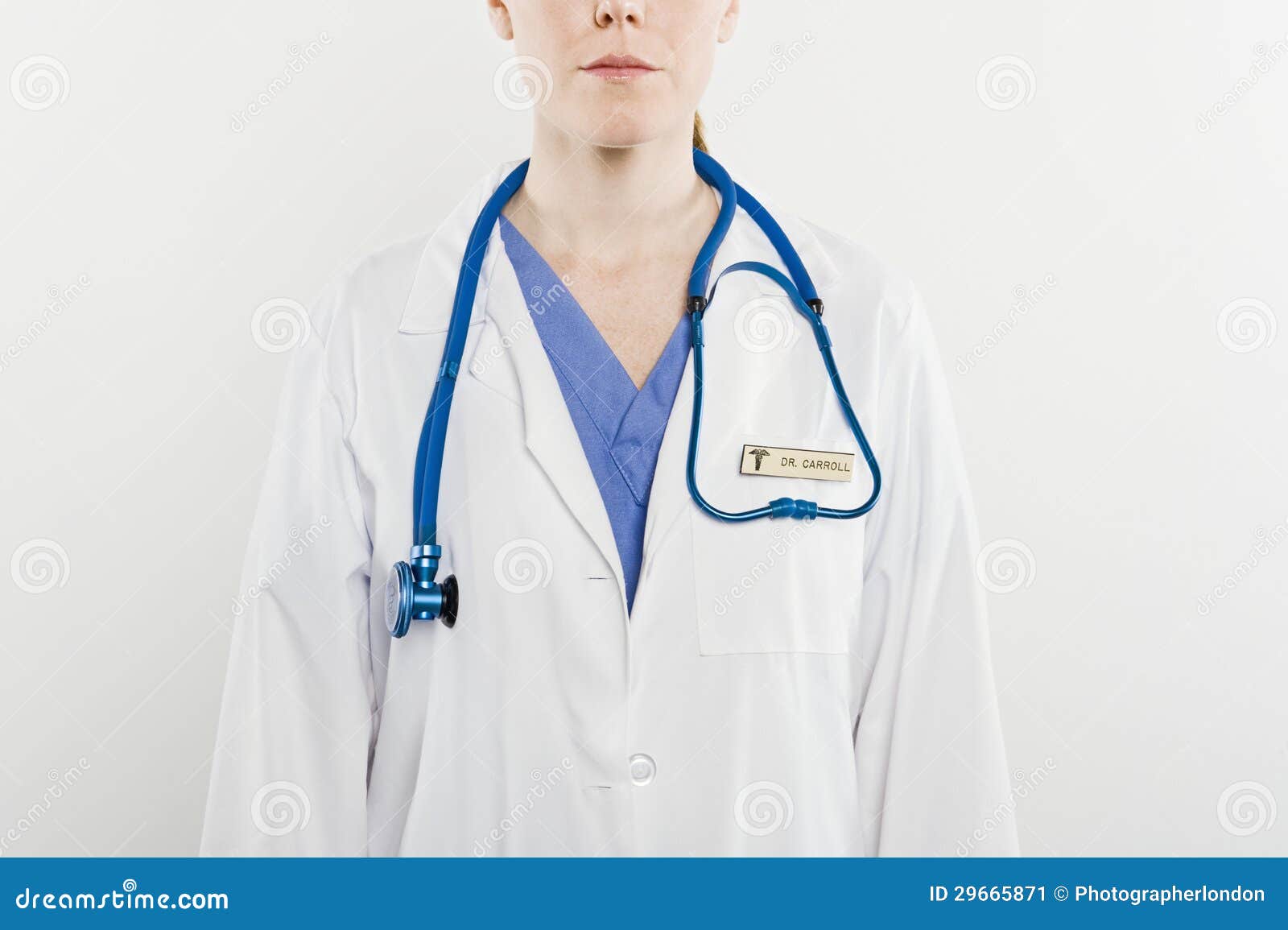 midsection of doctor with stethoscope around neck