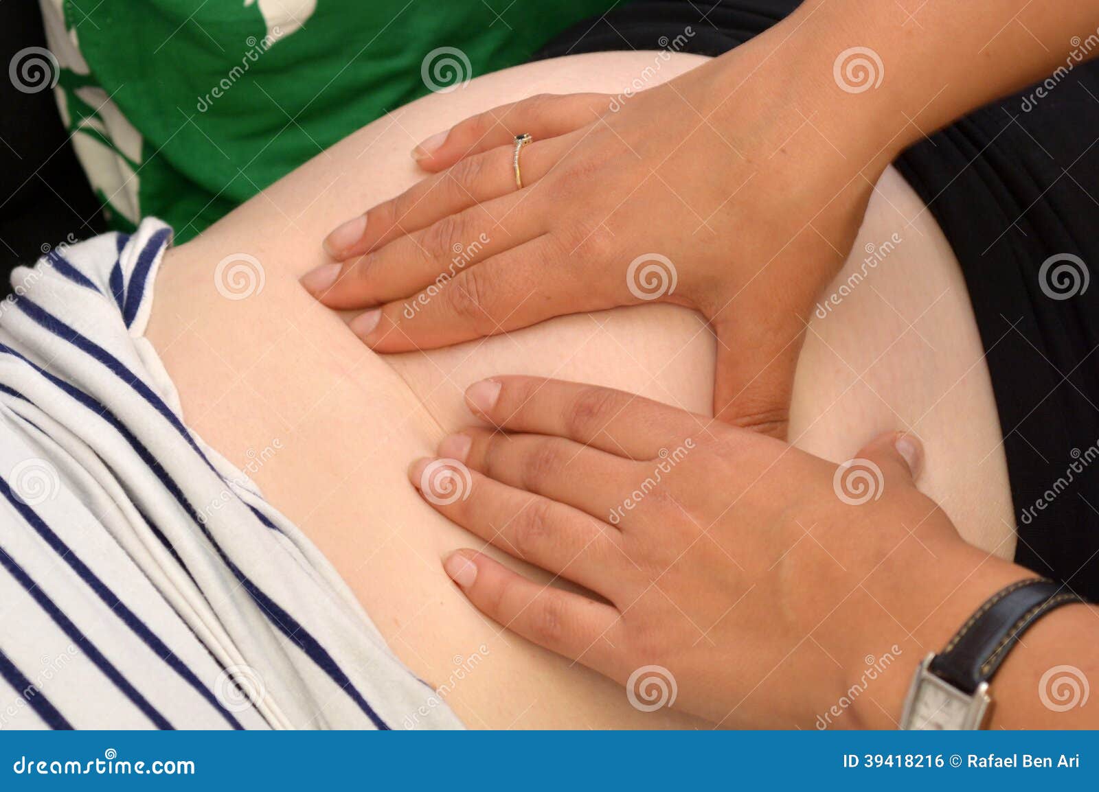 Midwife Checks Baby Heart Beat And Movement Stock Photo ...