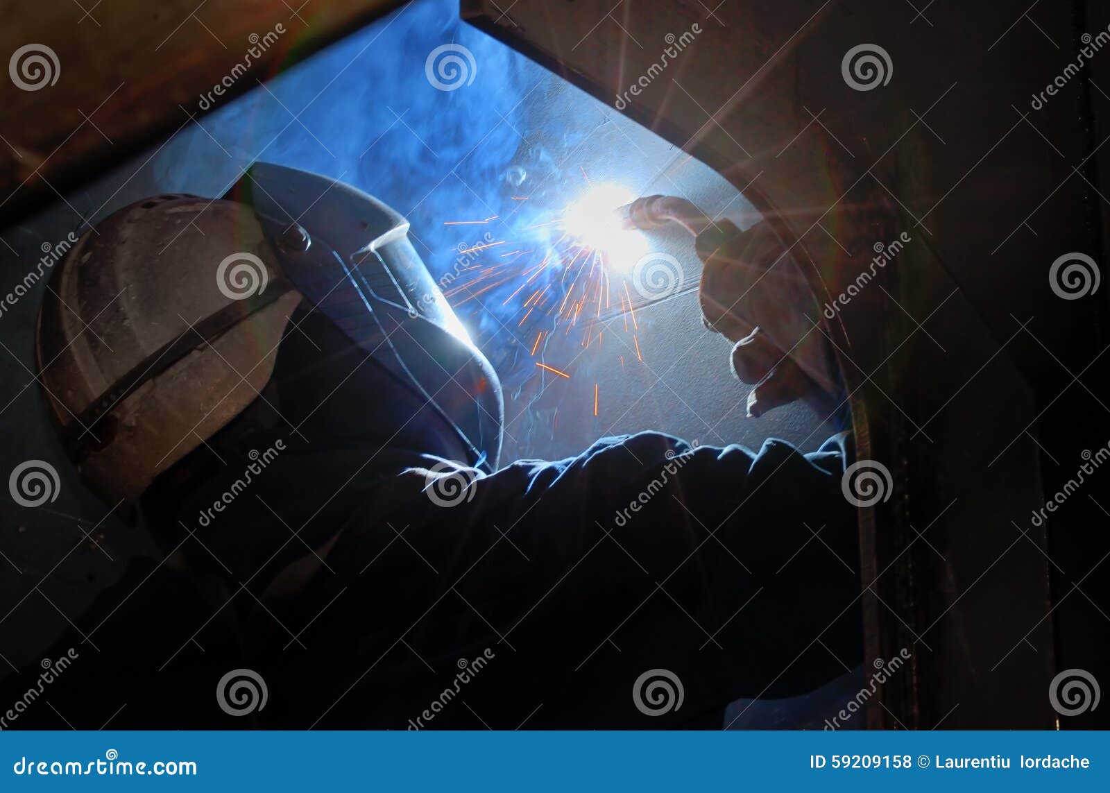 MIG welder uses torch stock photo. Image of industrial 59209158