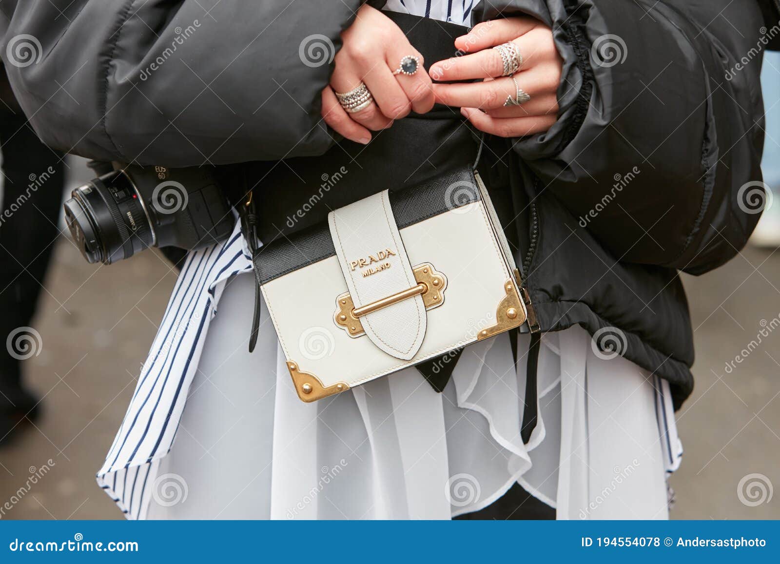 Woman with Prada Black and White Leather Bag and Rings before Fendi Fashion  Show, Milan Fashion Week Street Editorial Stock Photo - Image of week,  february: 194554078