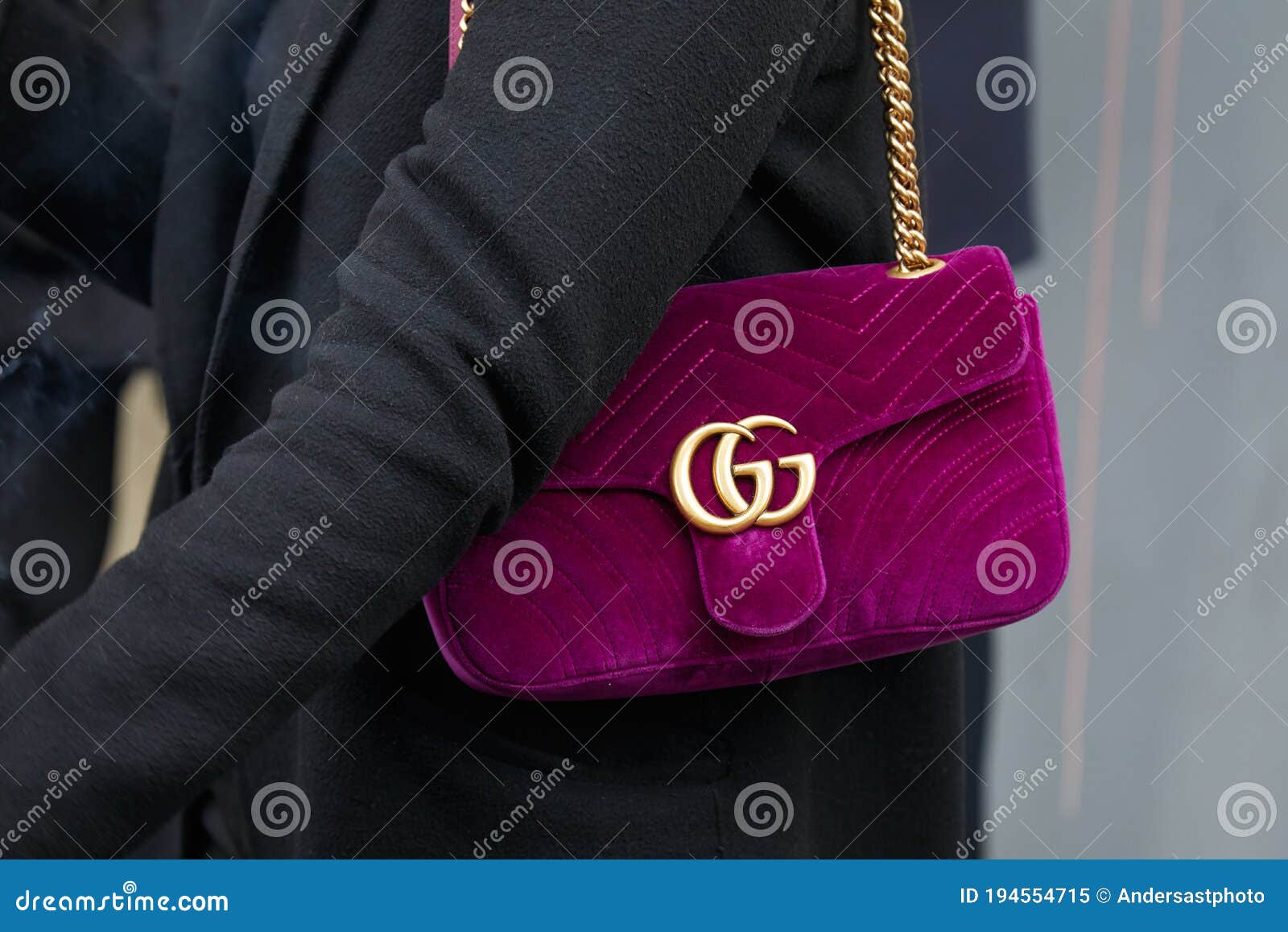 Woman with Purple Velvet Gucci Bag with Golden Logo and Chain before  Fashion Albino Teodoro Show, Milan Editorial Image - Image of outfit,  golden: 194554715