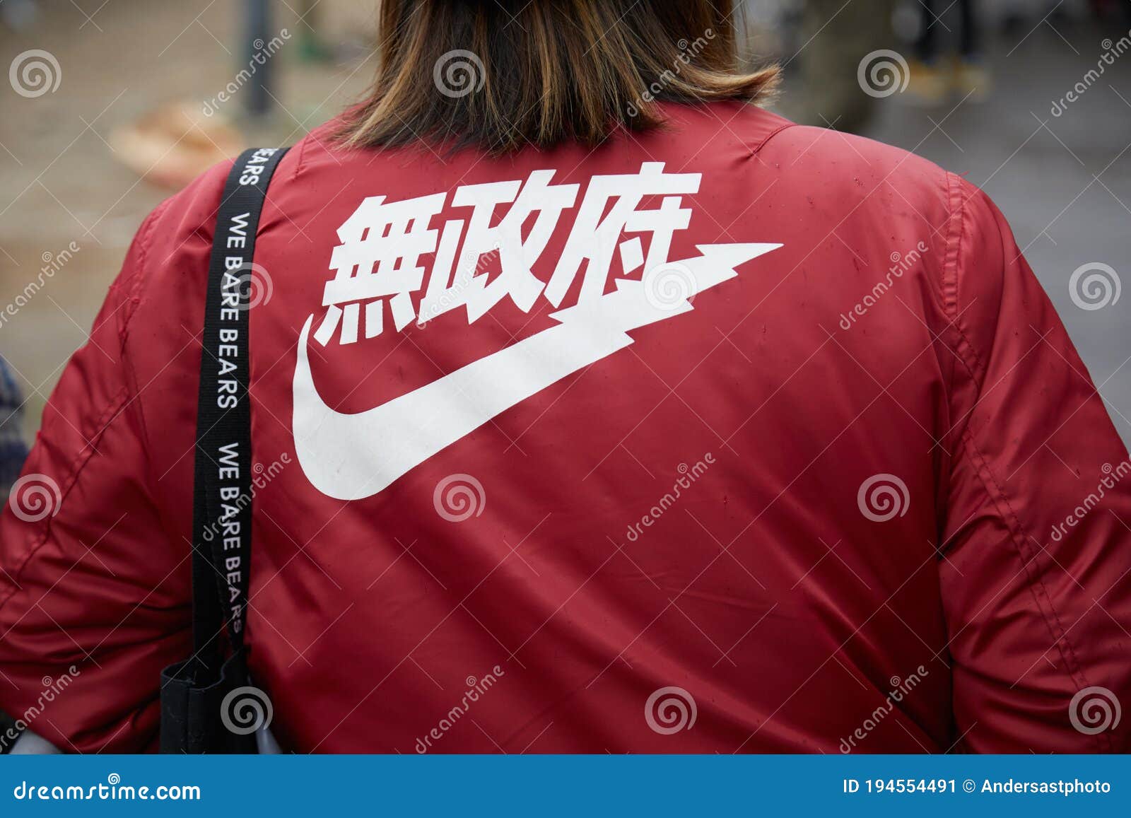 Woman with Red Bomber Jacket with White Nike Japanese before Fendi Fashion Show, Milan Fashion Week Editorial Photo - of look, street: 194554491