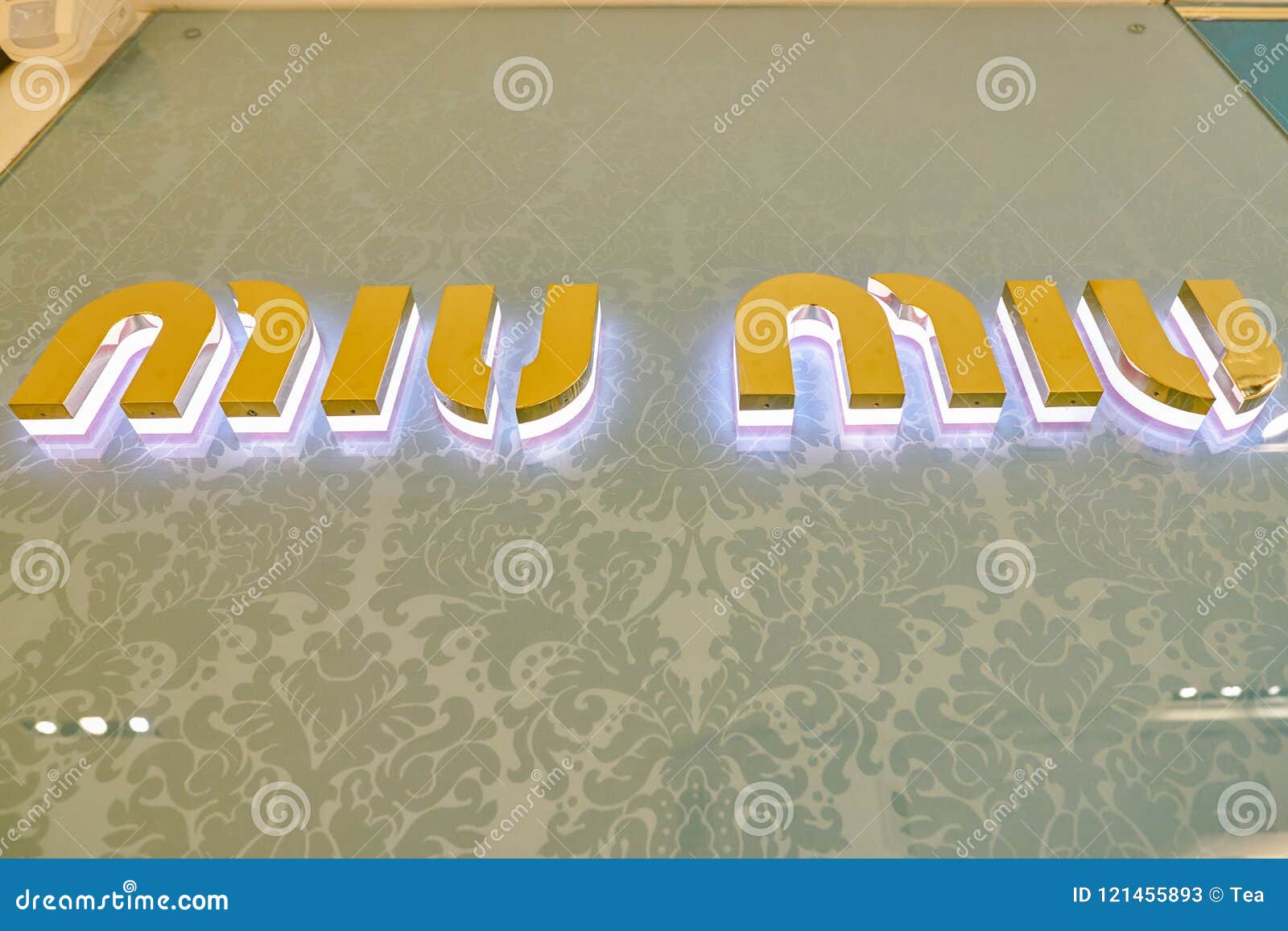 Miu Miu sign editorial stock photo. Image of color, stylish - 121455893