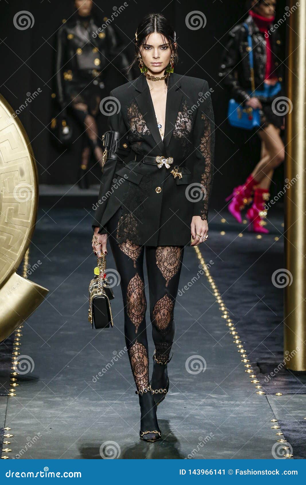 Kendall Jenner walks the runway at the Versace Ready to Wear fashion