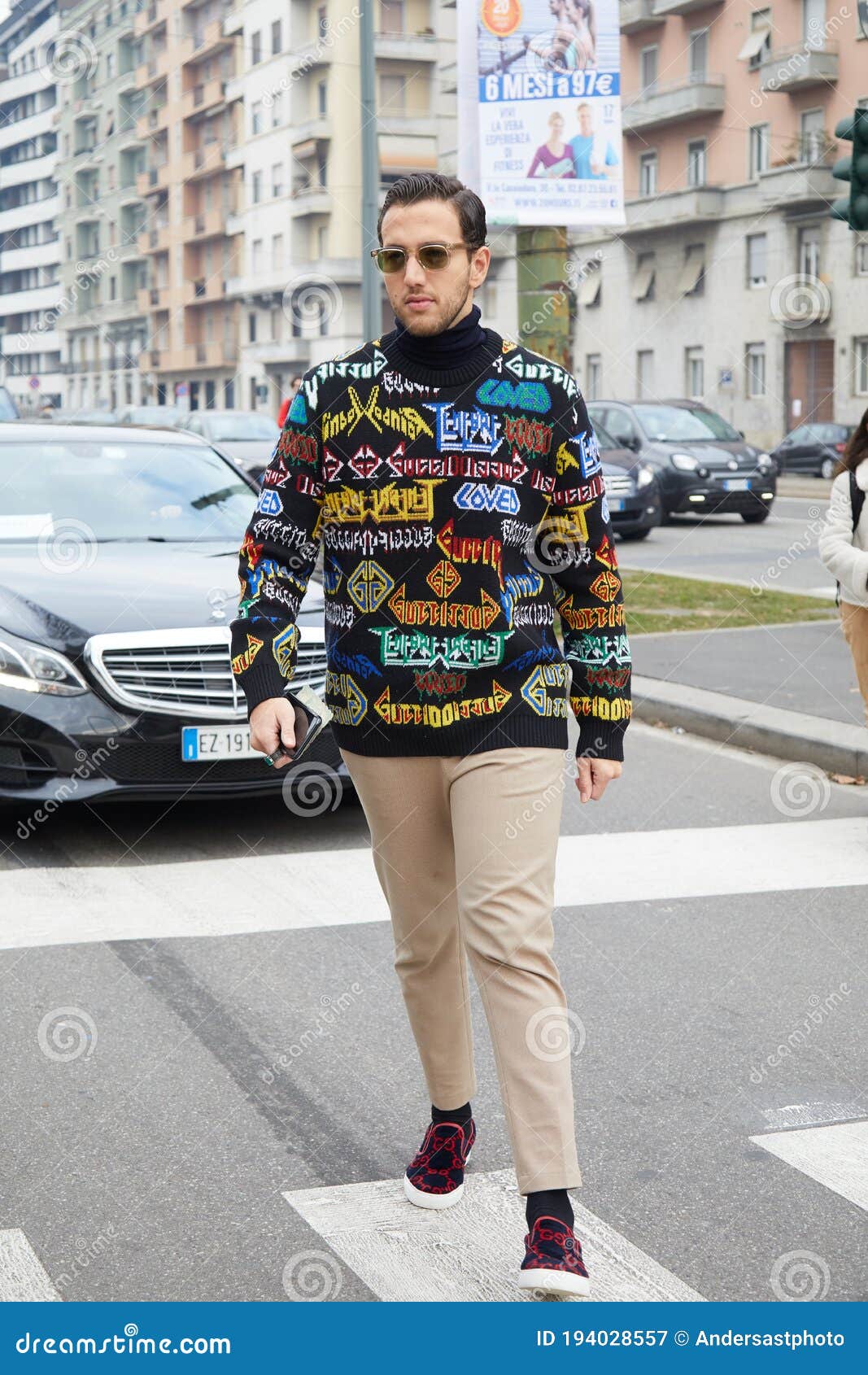 Man with Black Sweater with Colorful Writings Fashion Show, Milan Fashion Editorial Photography - Image of colorful: 194028557