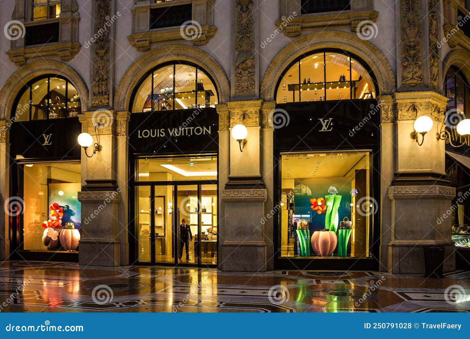 Italy milan louis vuitton store hi-res stock photography and