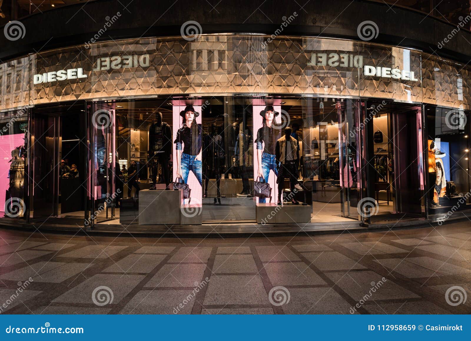 Milan, Italy - October 9, 2016: Shop Window and Entrance of a Di ...