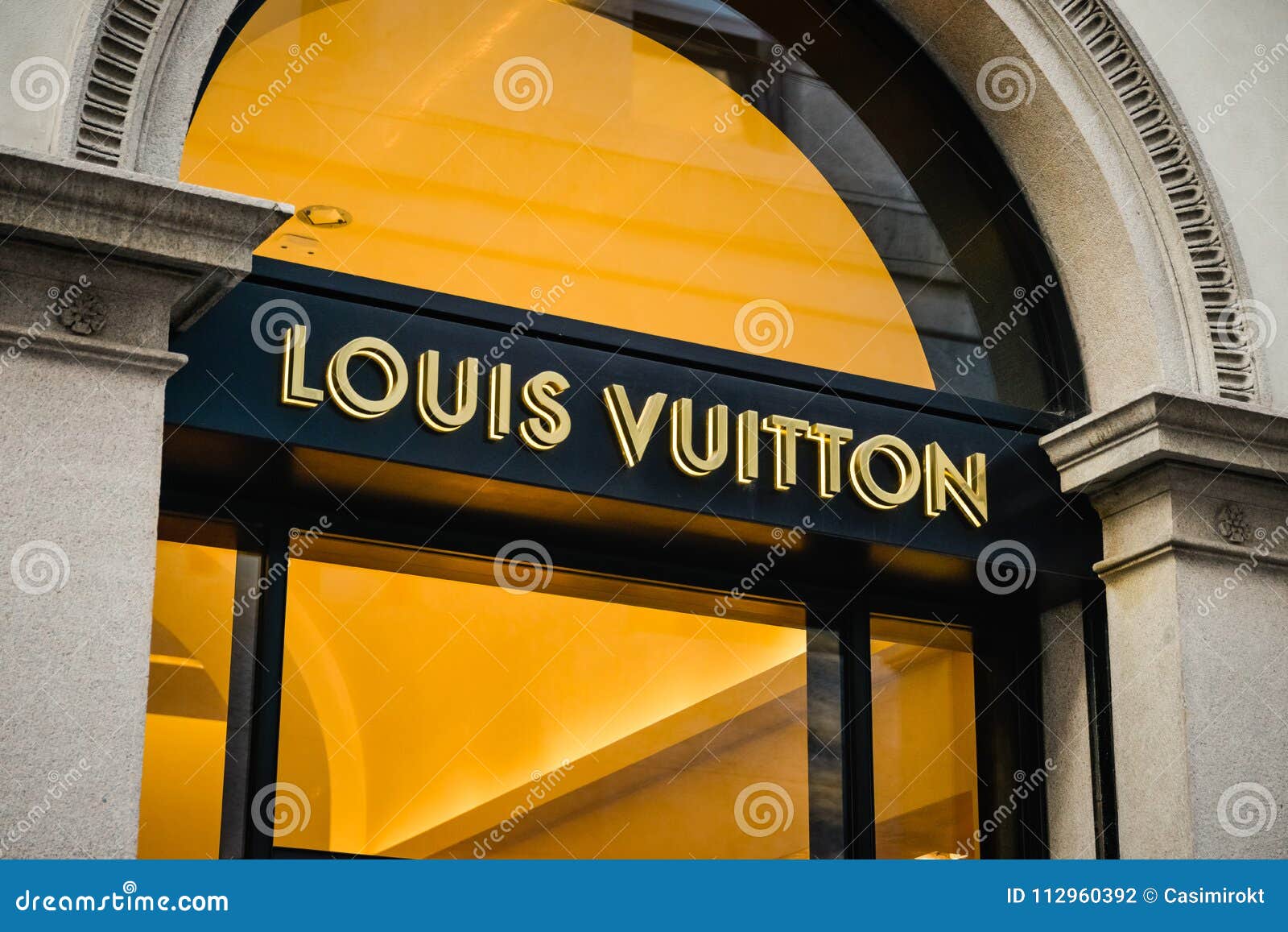 Italy milan louis vuitton store hi-res stock photography and