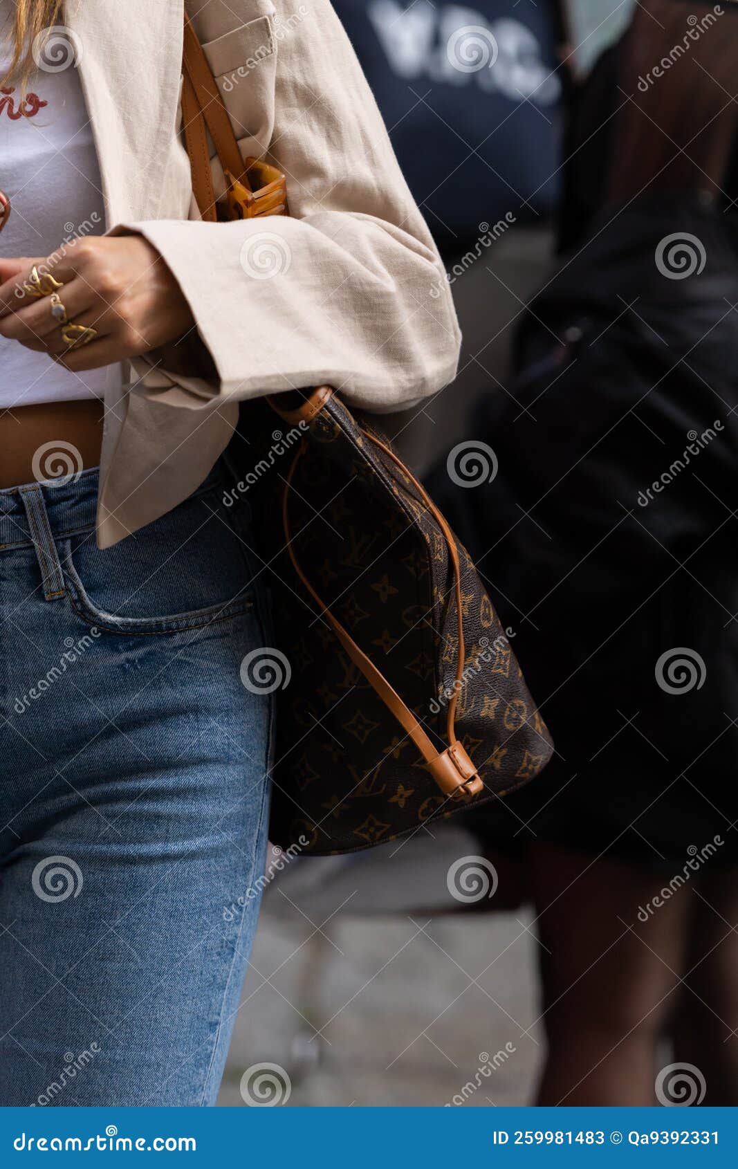 Milan, Italy - September, 21, 2022: Street Style Outfit Detail, Woman Wears  Brown LV Monogram Print Pattern Neverfull Editorial Stock Photo - Image of  2022, block: 259981483