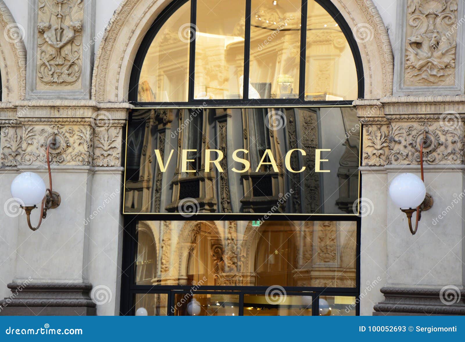 MILAN, ITALY - SEPTEMBER 7, 2017: Versace Signboard in Galleria ...