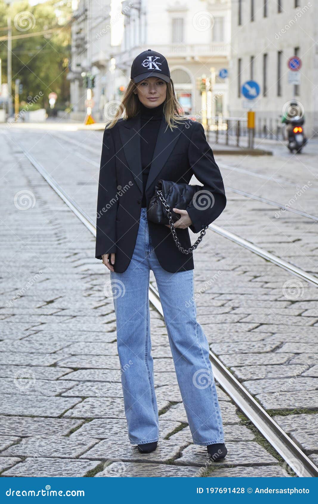 Woman with Black Calvin Klein Cap and Denim Trousers before  Fashion  Show, Milan Fashion Editorial Stock Photo - Image of outfit, woman:  197691428