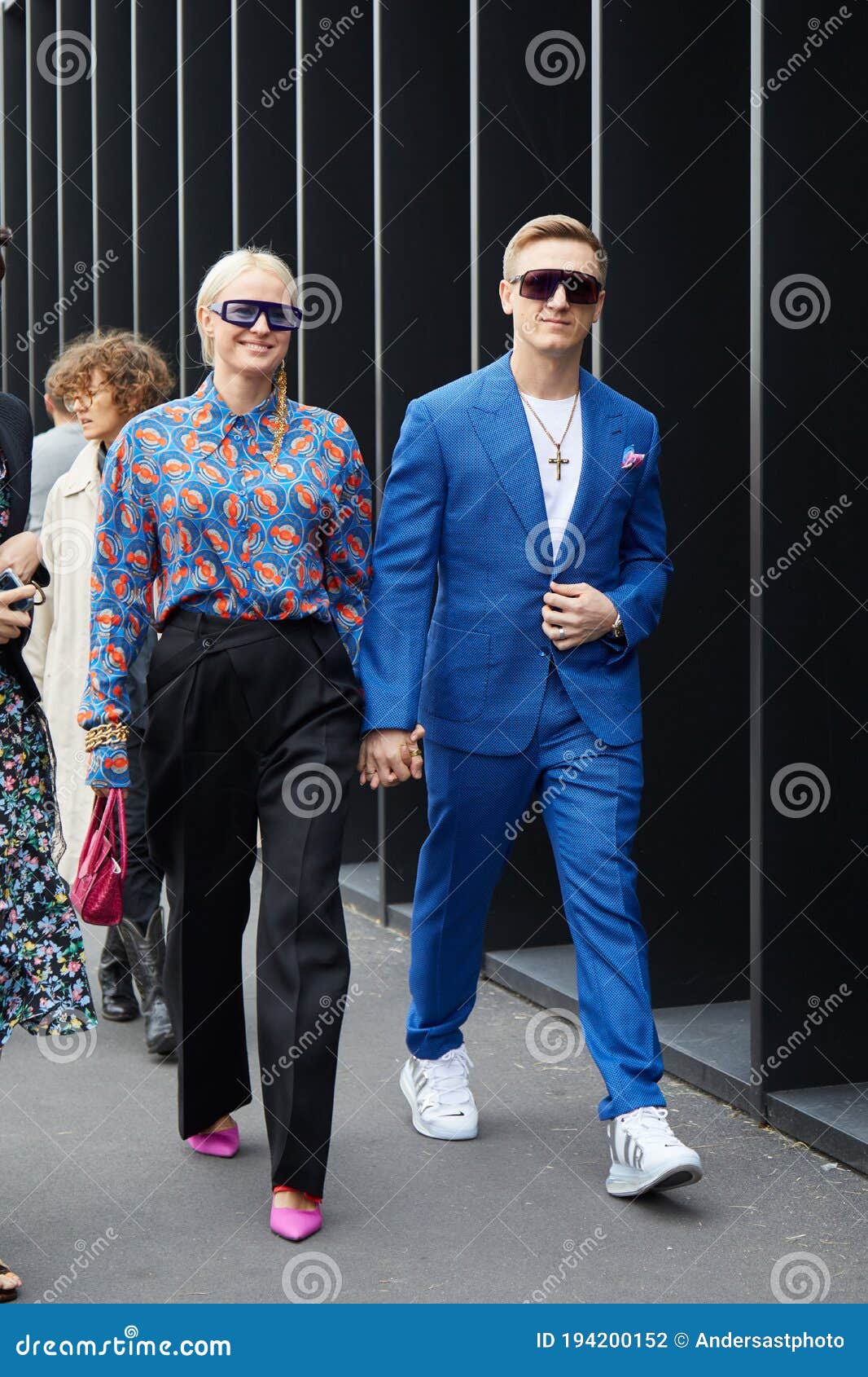 Woman And Man With Blue Suit And Pink 