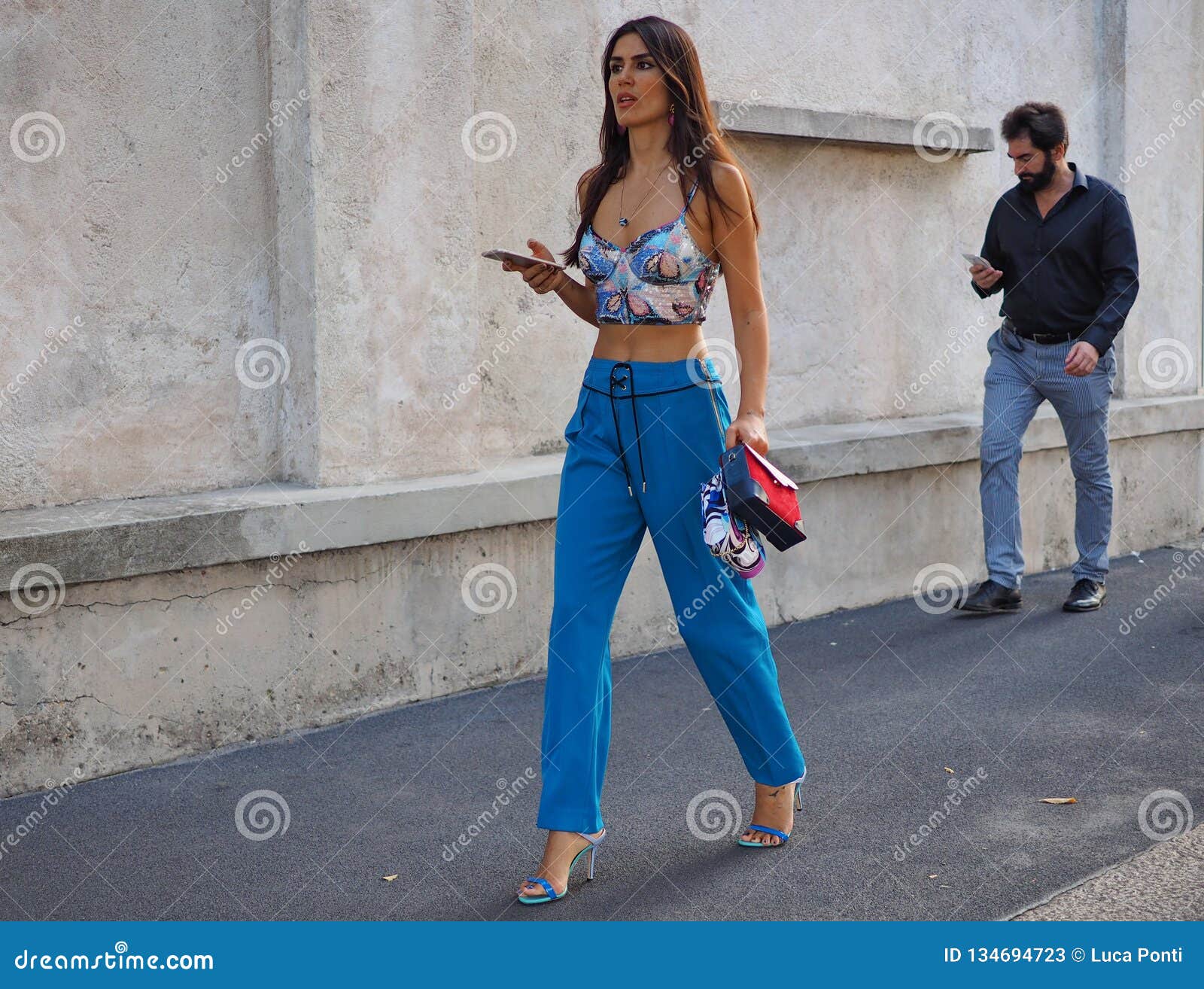 MILAN, ITALY - SEPTEMBER 18, 2019: Woman with Louis Vuitton black patent  leather bag before Prada fashion show, Milan Fashion Week street style  Stock Photo - Alamy