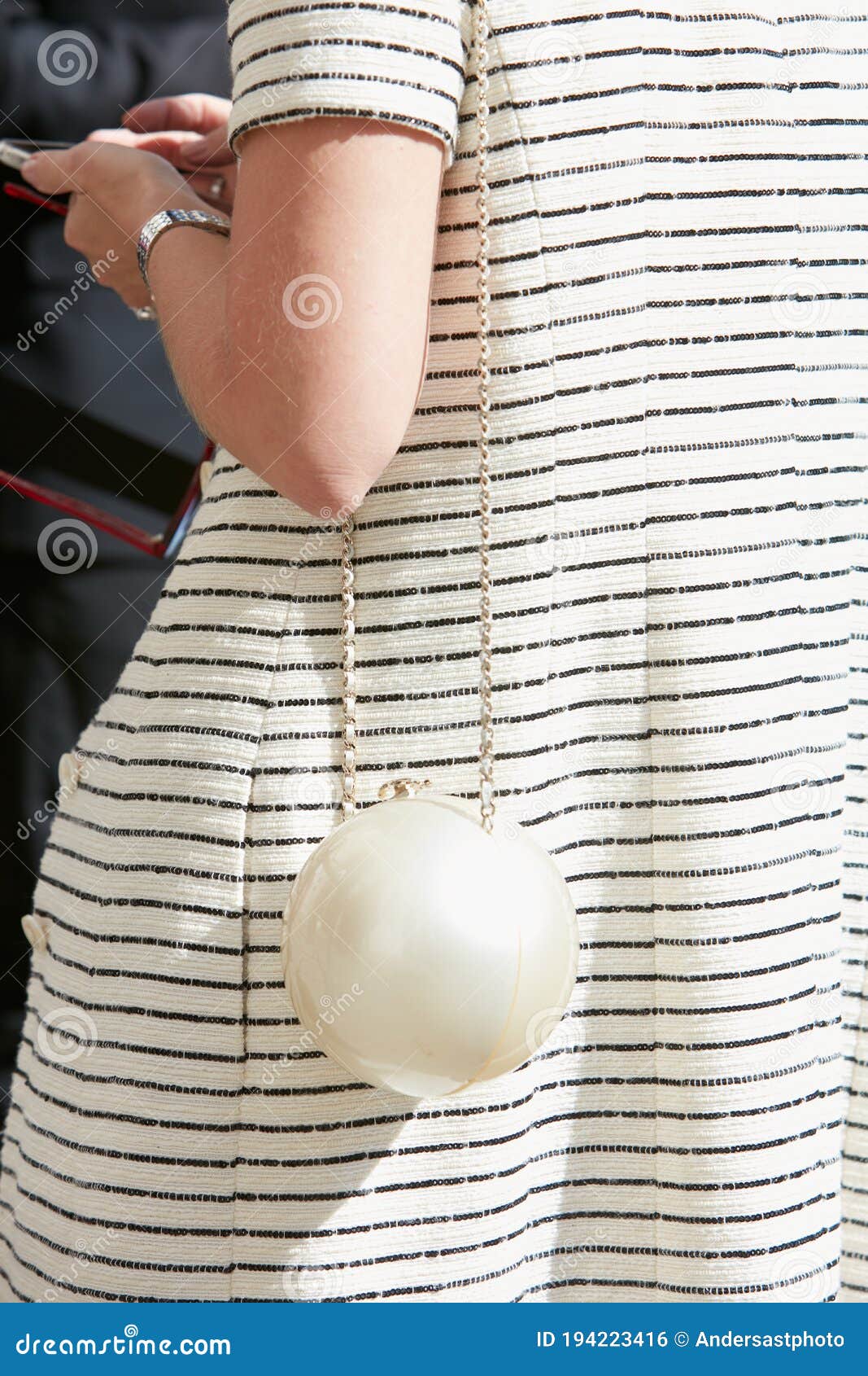 Woman with White Chanel Spere Bag before Genny Fashion Show, Milan