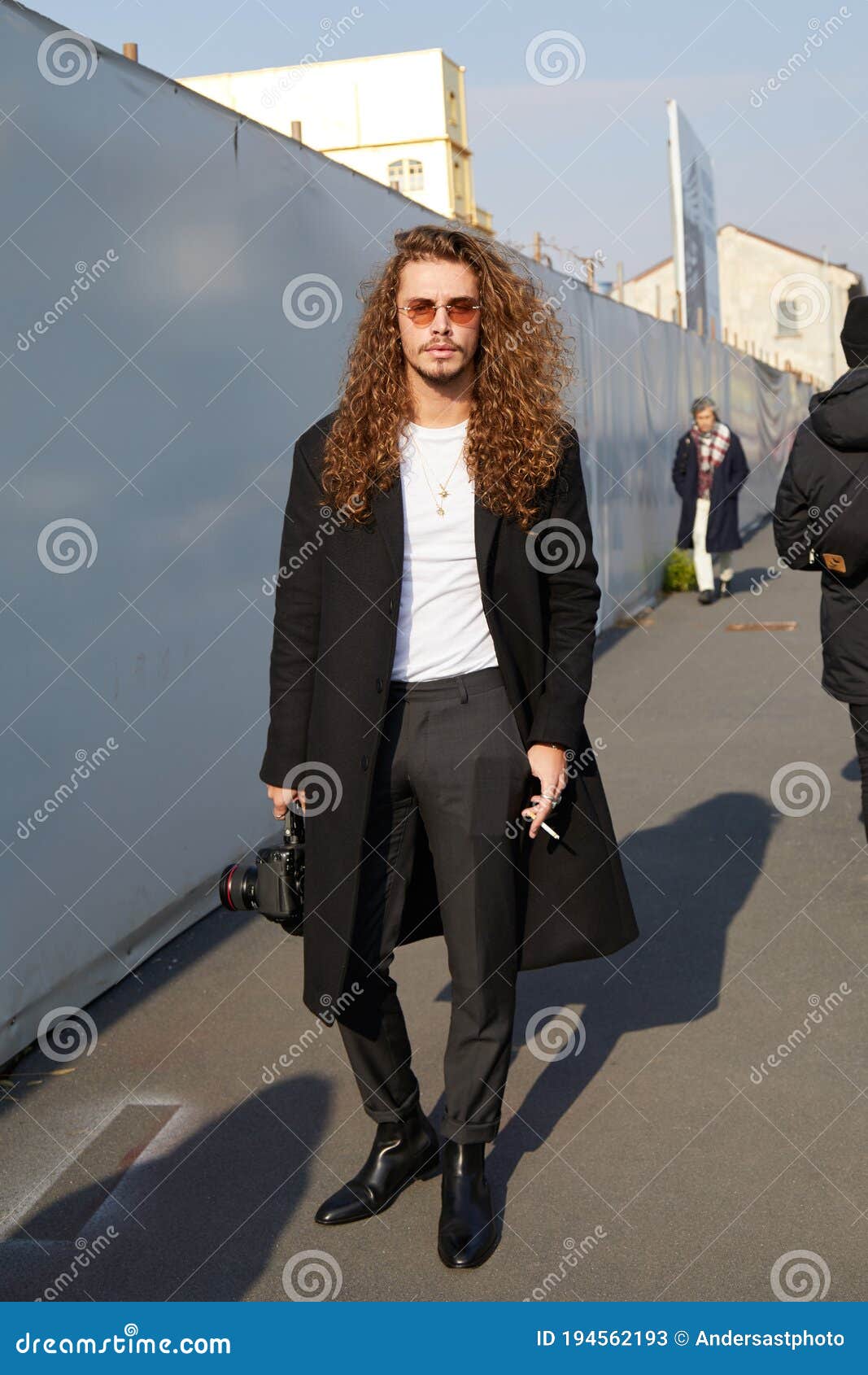 Elegant Man with Long Curly Hair and Sunglasses before Dsquared 2 Fashion  Show, Milan Fashion Week Street Editorial Stock Photo - Image of sunlight,  street: 194562193