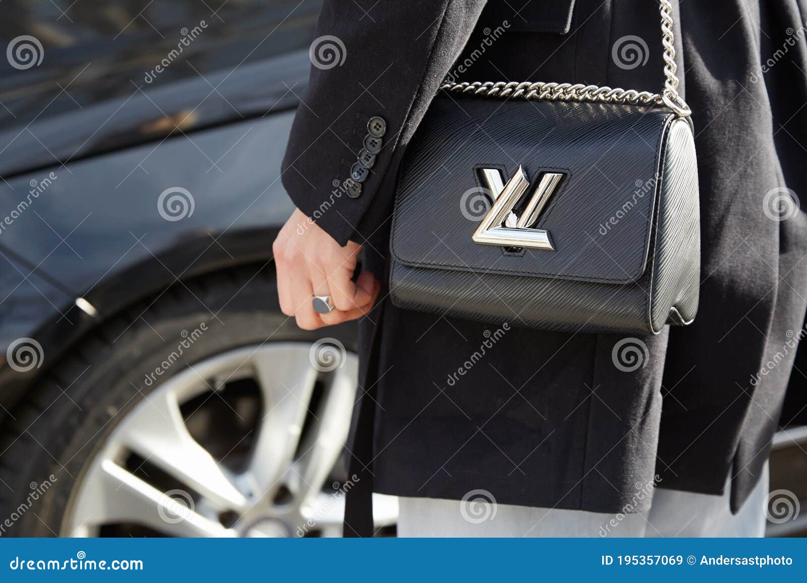 Linda Tol with Louis Vuitton Twist Lock Black Bag before Emporio Armani  Fashion Show on January 18, 2015 in Editorial Stock Image - Image of  silver, woman: 195357069