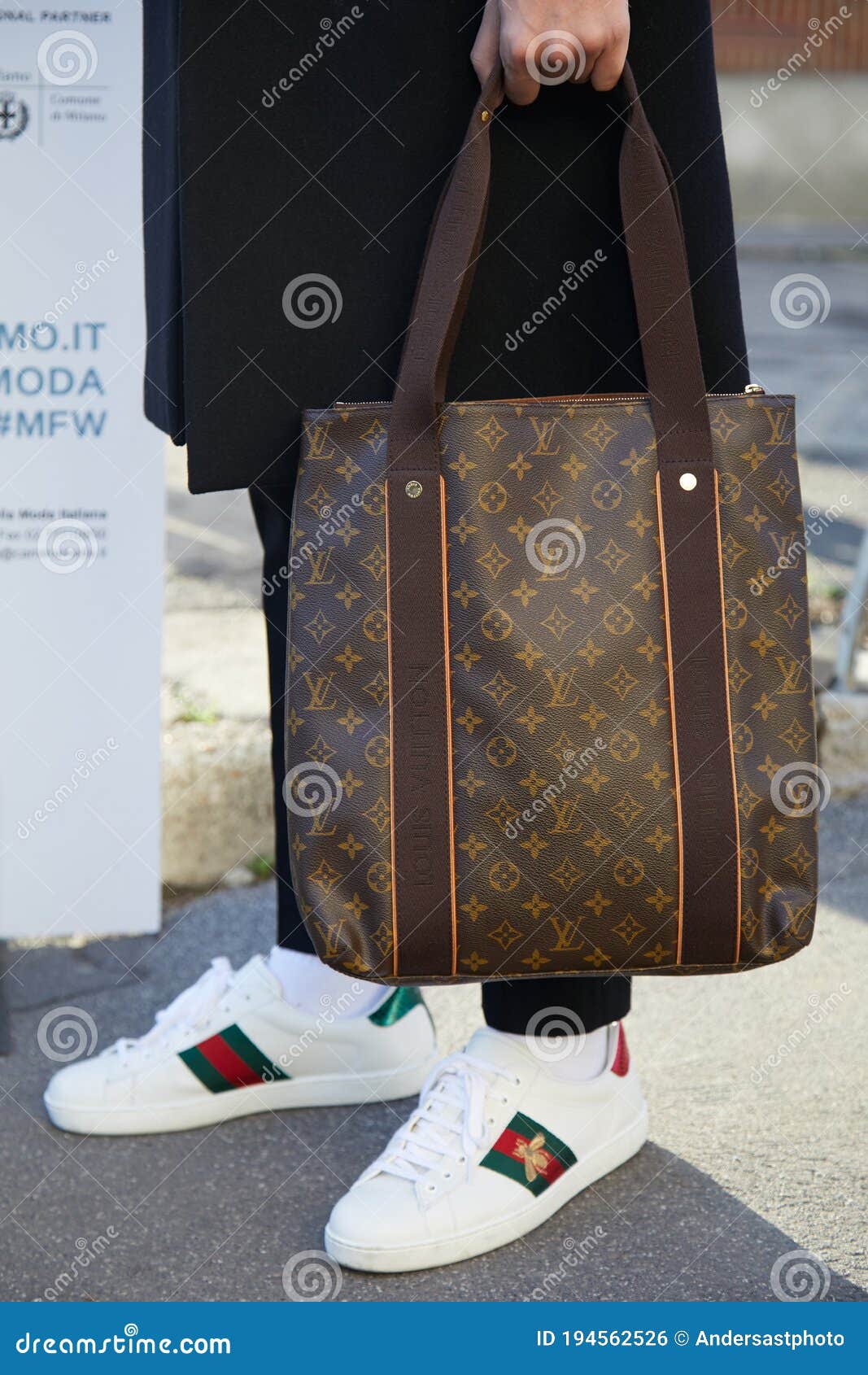 Man with Louis Vuitton Bag and White Gucci Shoes before Diesel