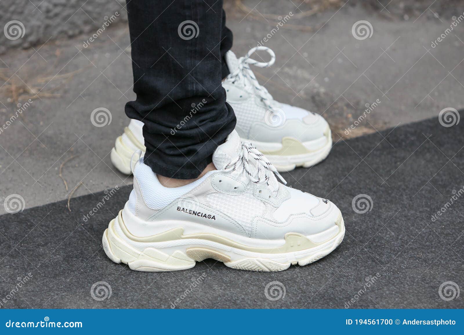 Man with White Balenciaga Sneakers and Black Trousers before Fendi ...