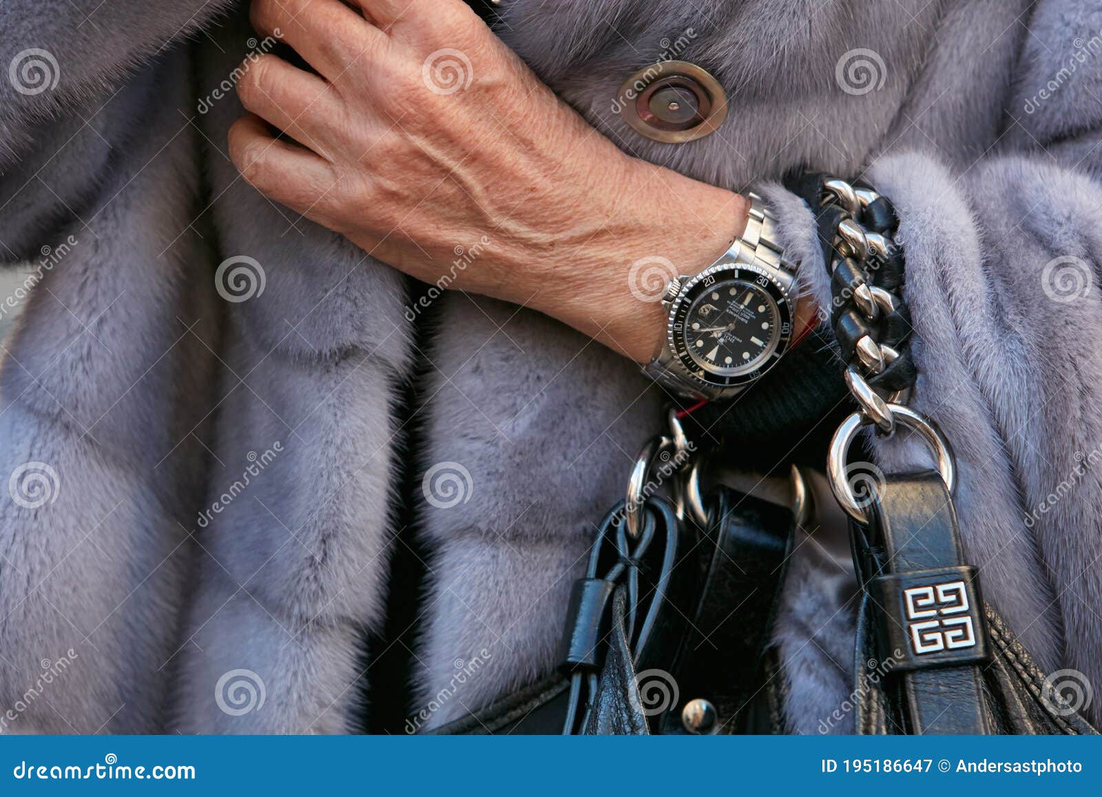 Woman with Submariner Watch and Gray Fur Coat before Salvatore Fashion Show, Milan Fashion Editorial Photography - Image of style, hand: 195186647