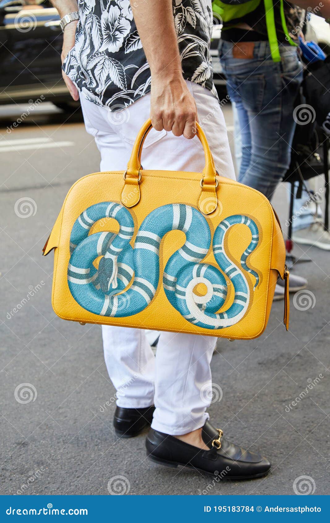 Man with with Gucci Bag with Blue Snake and White Trousers before Les Hommes Fashion Show, Milan Fashion Editorial Stock Image - Image of week, blue: 195183784