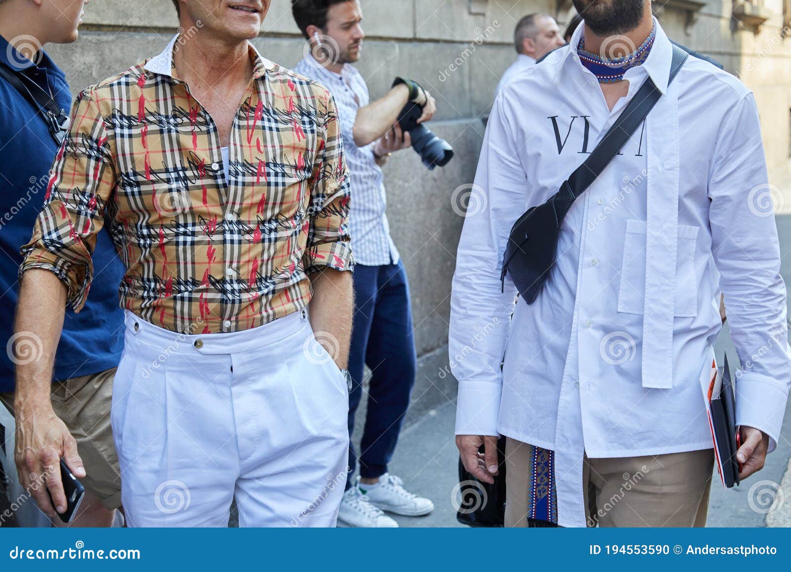 Men with Burberry Shirt and Valentino White Shirt Walking before Les Hommes  Fashion Show, Milan Fashion Week Editorial Image - Image of trousers,  luxury: 194553590