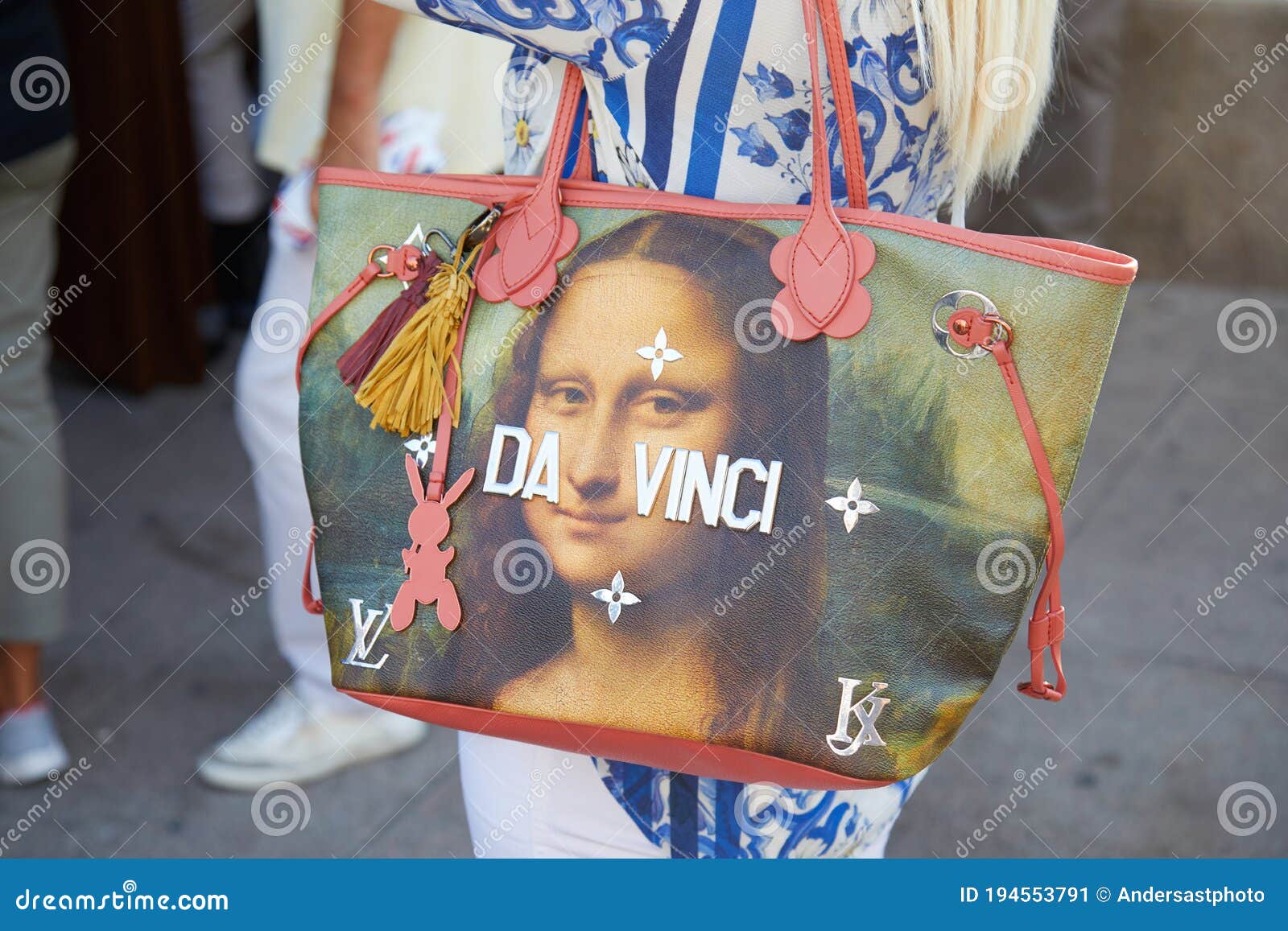 Woman with Da Vinci Louis Vuitton Bag with Mona Lisa before Alberta  Ferretti Fashion Show, Milan Fashion Week Editorial Photo - Image of  flowers, alberta: 194553791