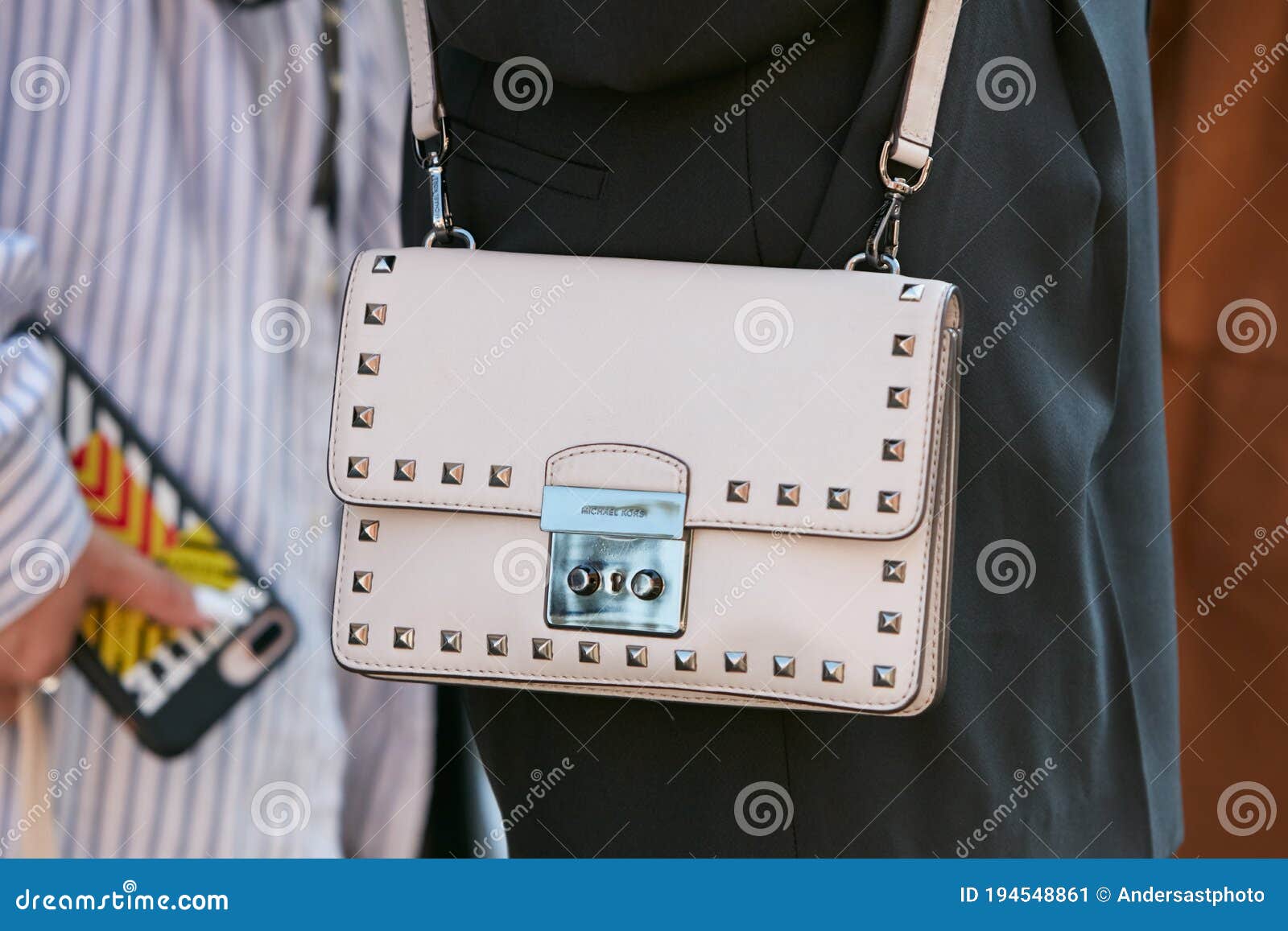 Woman with Pale Pink Michael Kors Leather Bag with Studs before Prada  Fashion Show, Milan Fashion Week Street Editorial Photo - Image of  accessory, elegant: 194548861