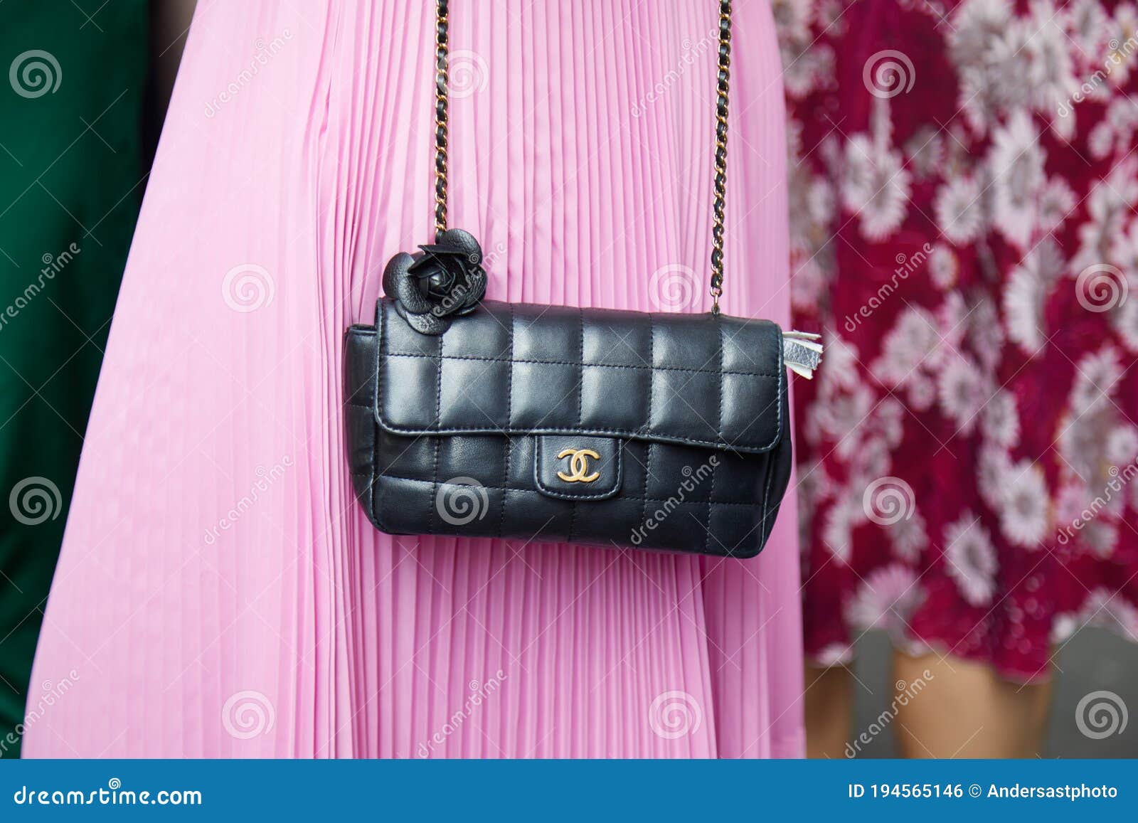 Woman with Pink Leather Chanel Bag before Genny Fashion Show