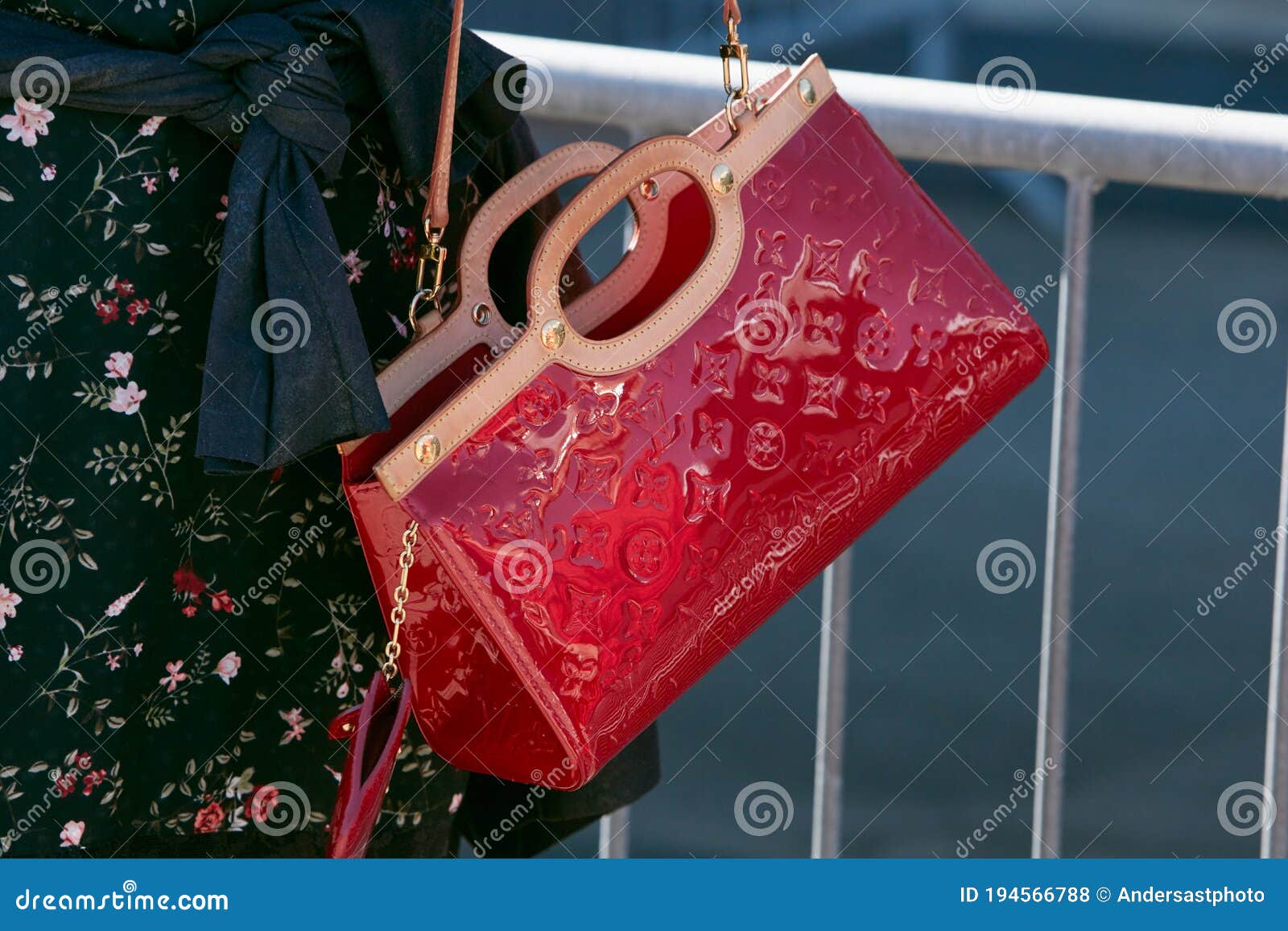 Woman with Red Shiny Louis Vuitton Bag and Floral Dress before Alberto  Zambelli Fashion Show, Milan Fashion Editorial Stock Photo - Image of  outfit, floral: 194566788