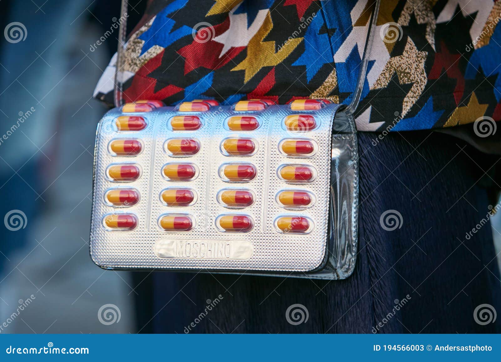 Woman with Silver Moschino Bag with Yellow and Red Capsule Medicines before  Max Mara Fashion Show, Milan Editorial Stock Photo - Image of woman,  people: 194566003