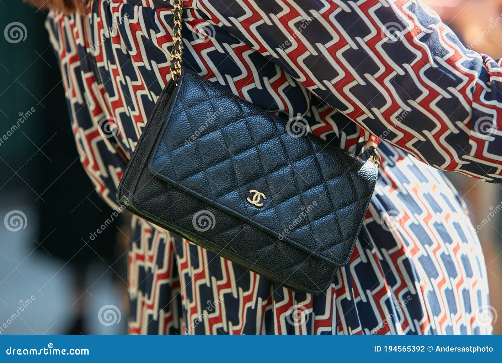 Woman with Small Chanel Black Leather Bag and Red and Blue Dress before  Giorgio Armani Fashion Show, Milan Editorial Photography - Image of italy,  chanel: 194565392