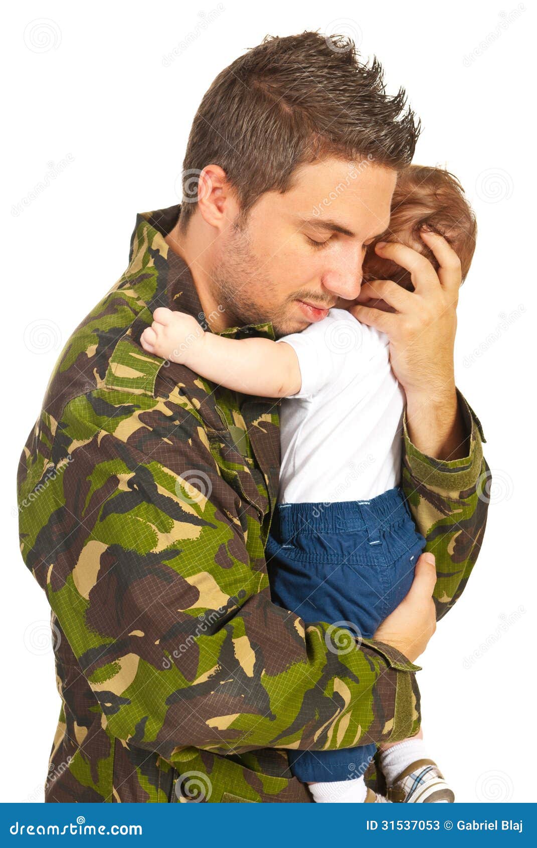 military father embracing his baby son