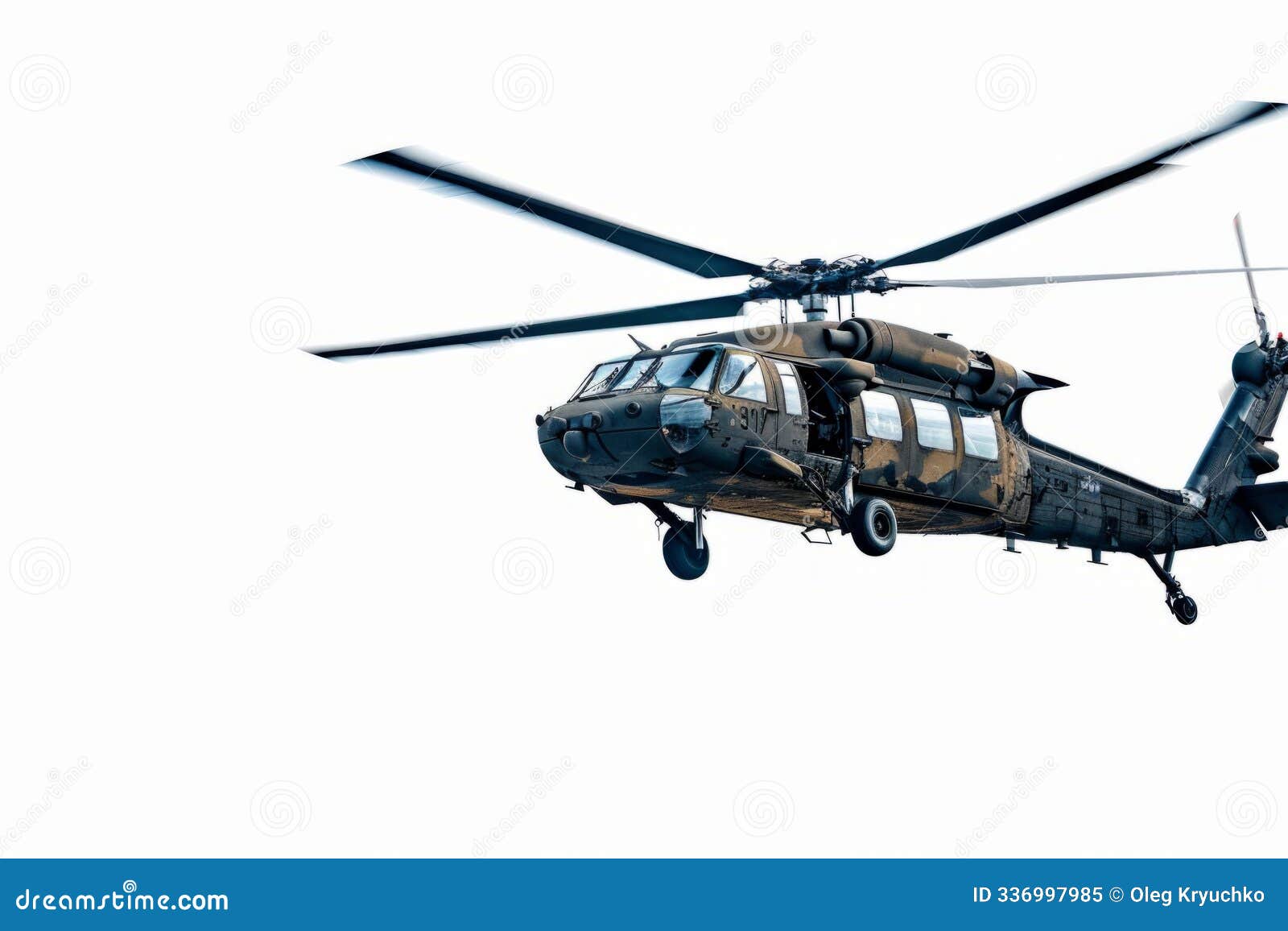 a military helicopter flies confidently through the air. its powerful rotors create a dynamic motion. this image