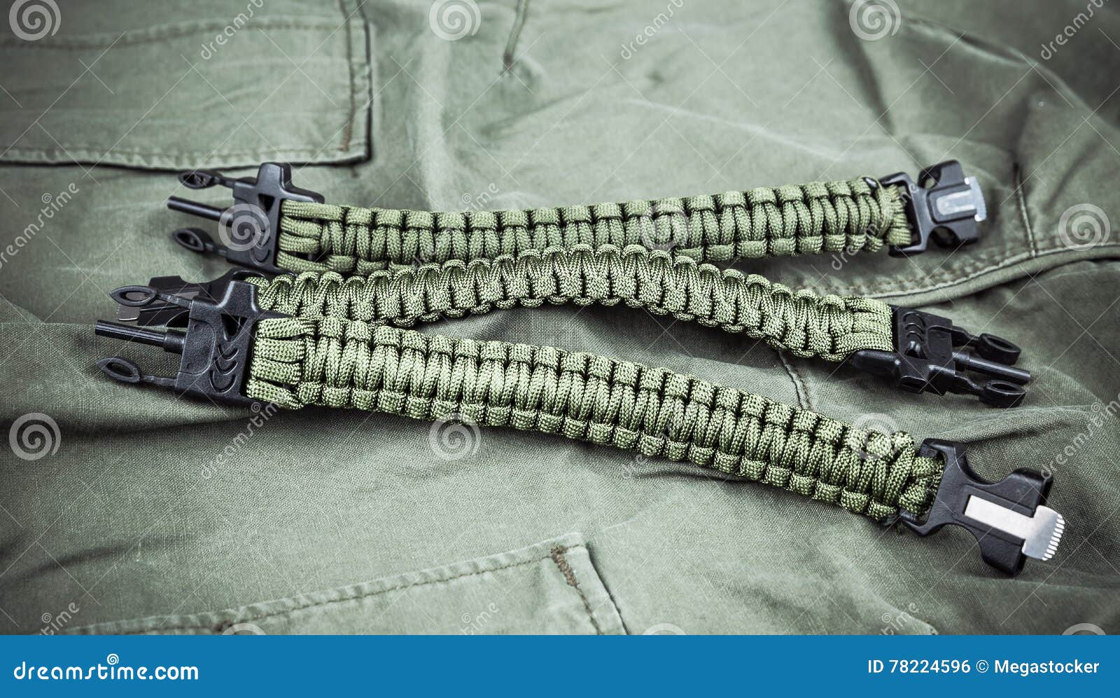 Military Paracord Bracelets on Army-green Fabric Stock Photo - Image of  fabric, style: 78224596