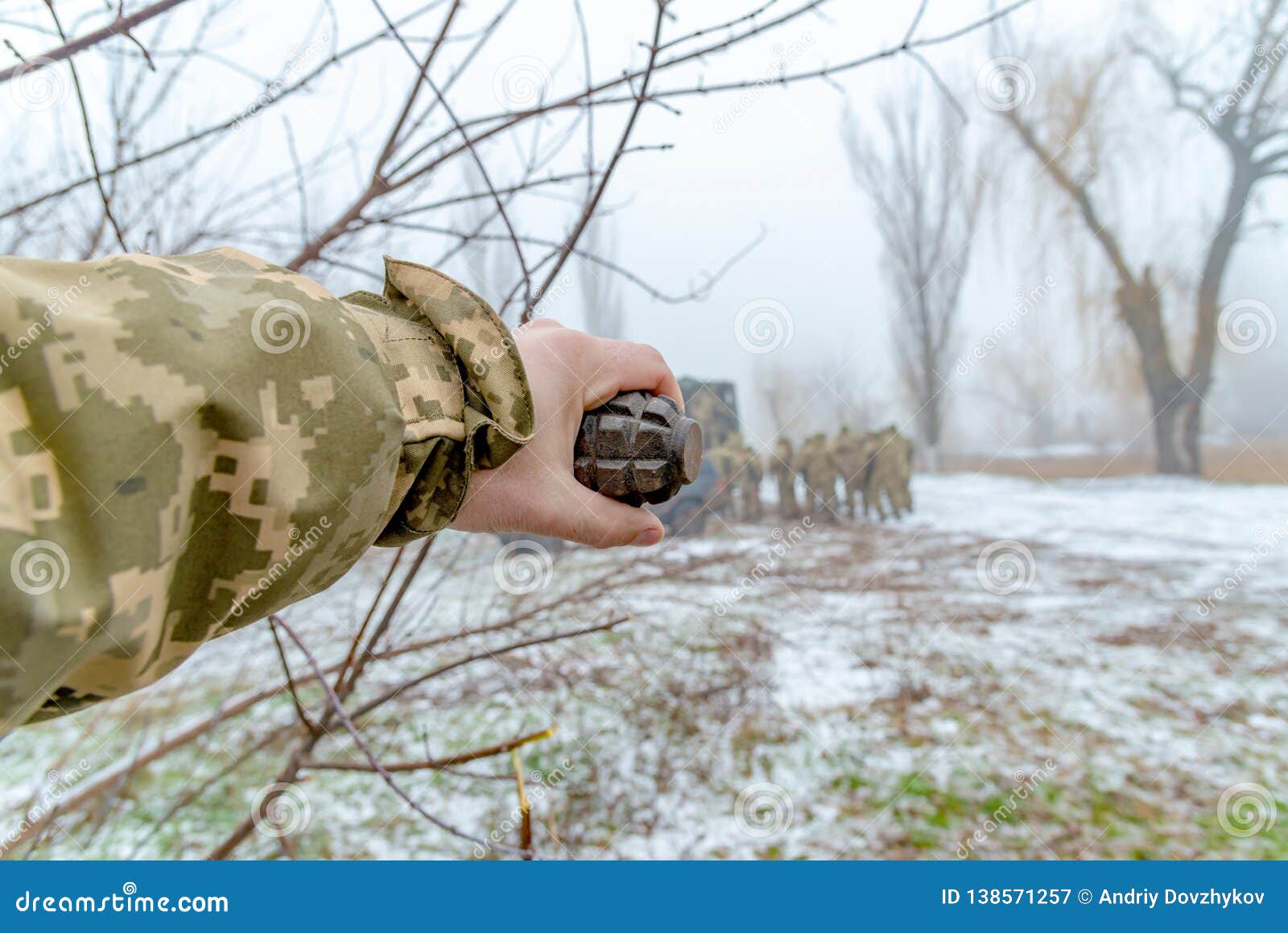 The Military Throws a Fragmentation Grenade with His Hand Stock Image