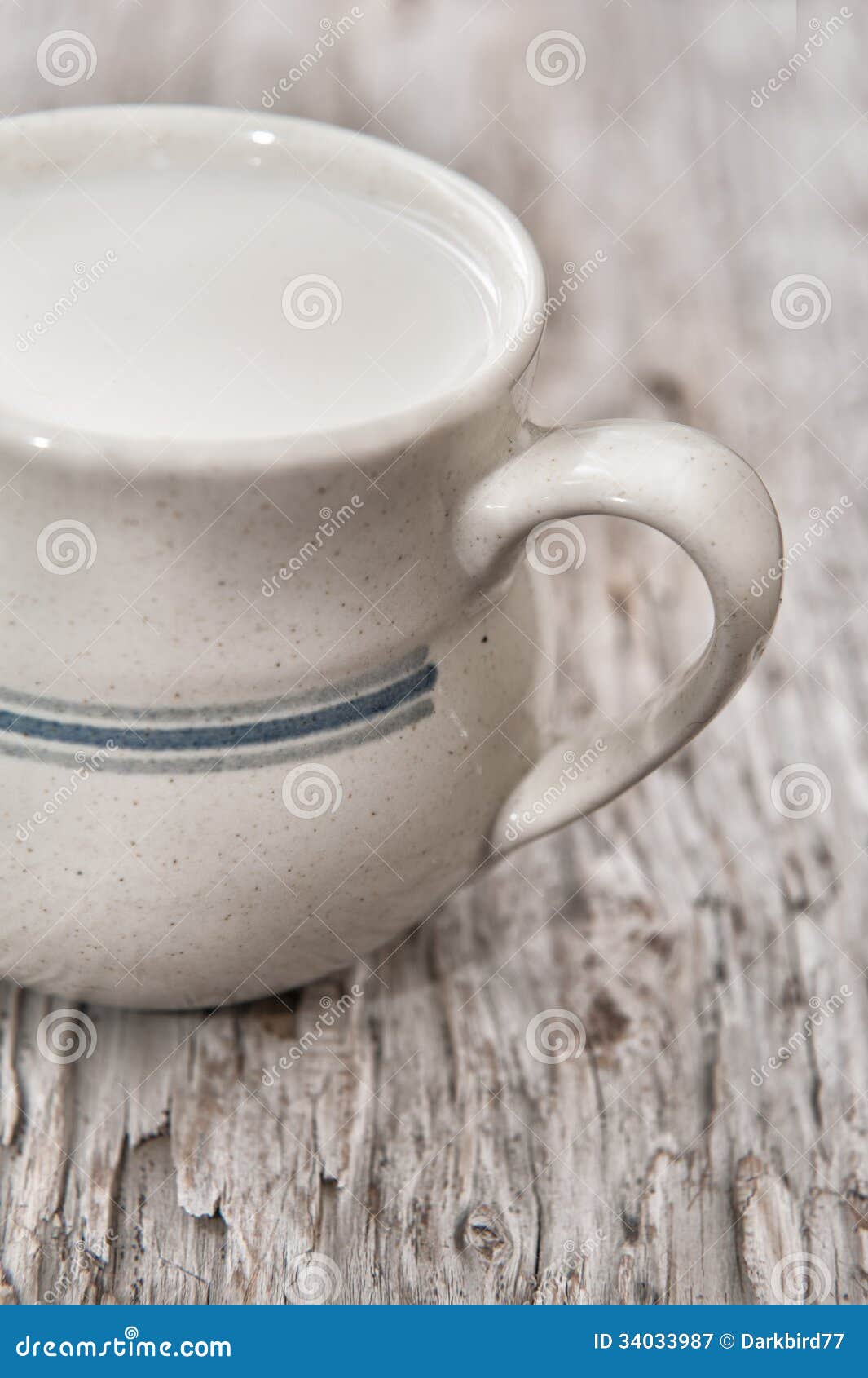 Milk in ceramic mug stock image. Image of weathered, dairy 34033987