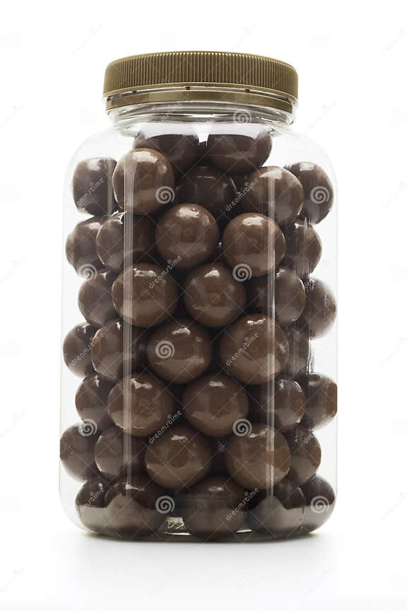 Milk chocolate coated nuts stock image. Image of background 12949063