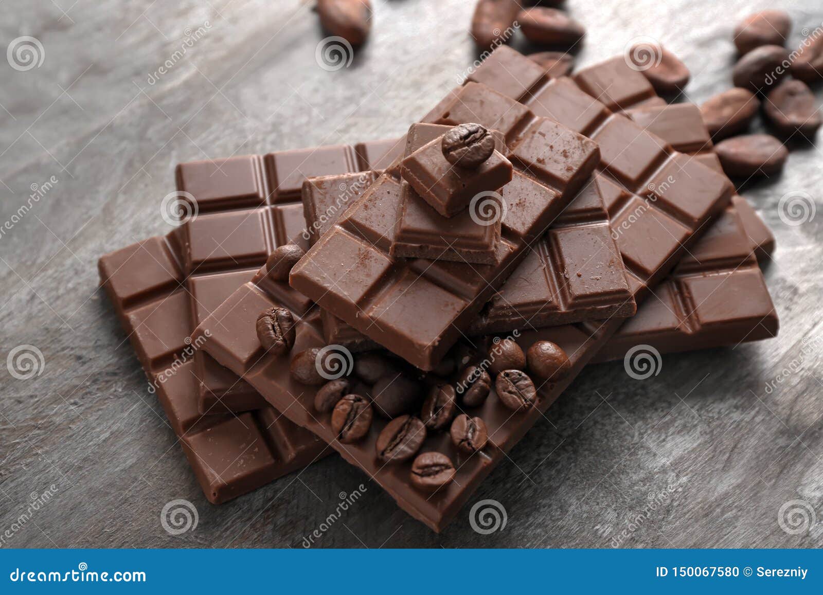 Milk Chocolate with Coffee Beans on Wooden Background Stock Photo